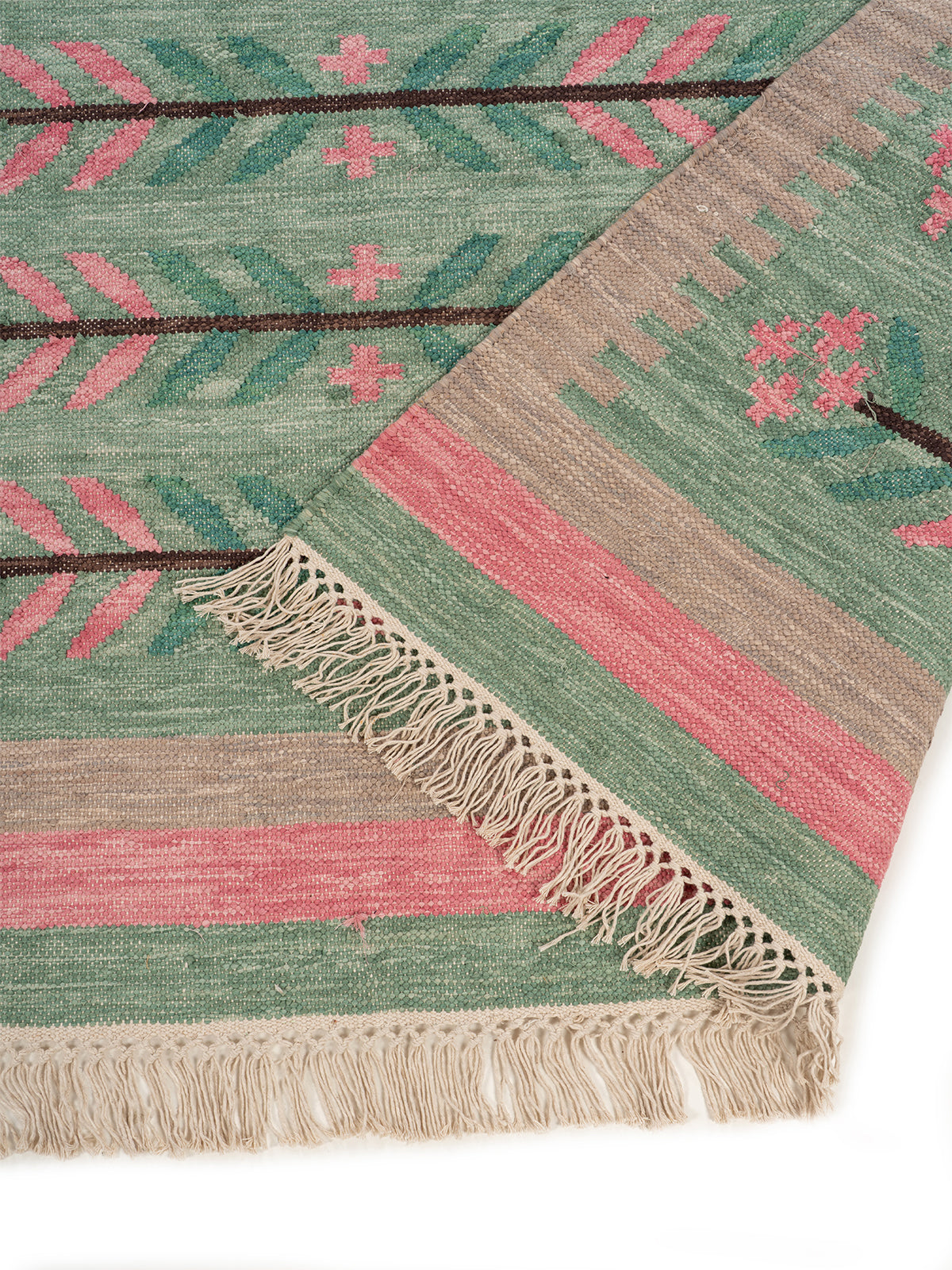 Folk Botanical Flatweave Rug detail of the floral motif in wool cut pile
