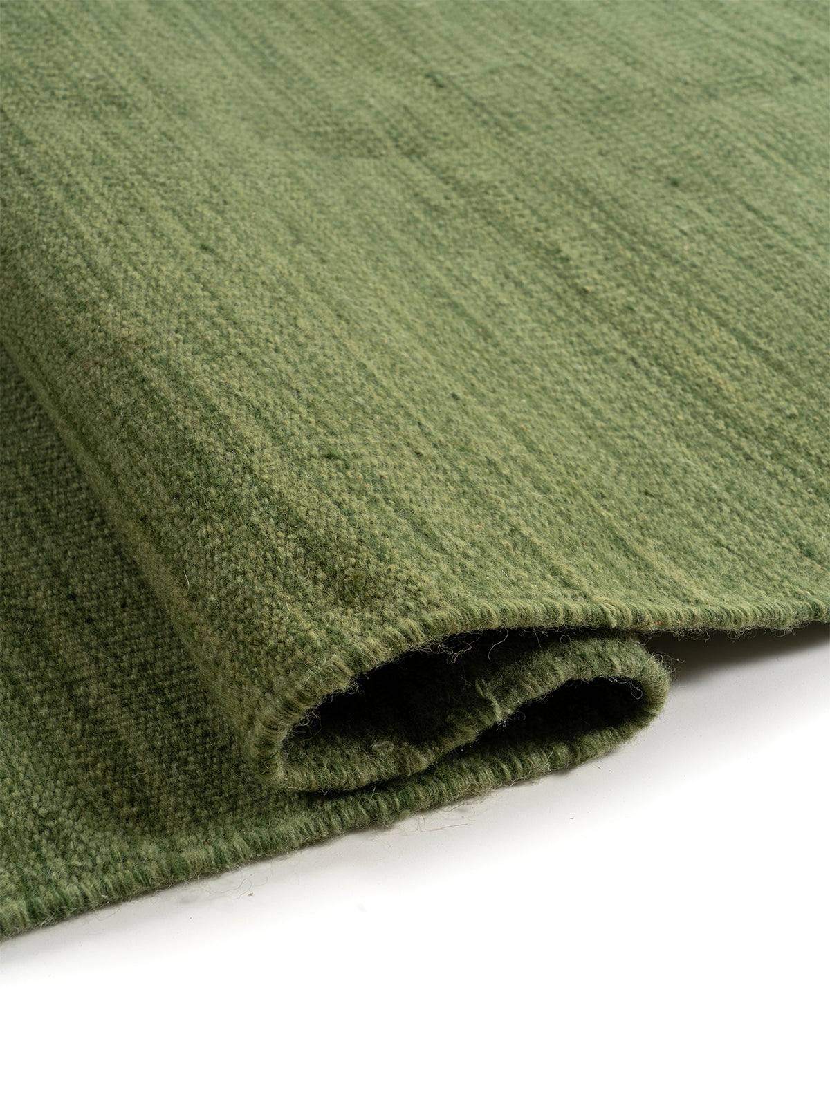 Forest Green Marl Flatweave Rug - texture detail showing wool surface