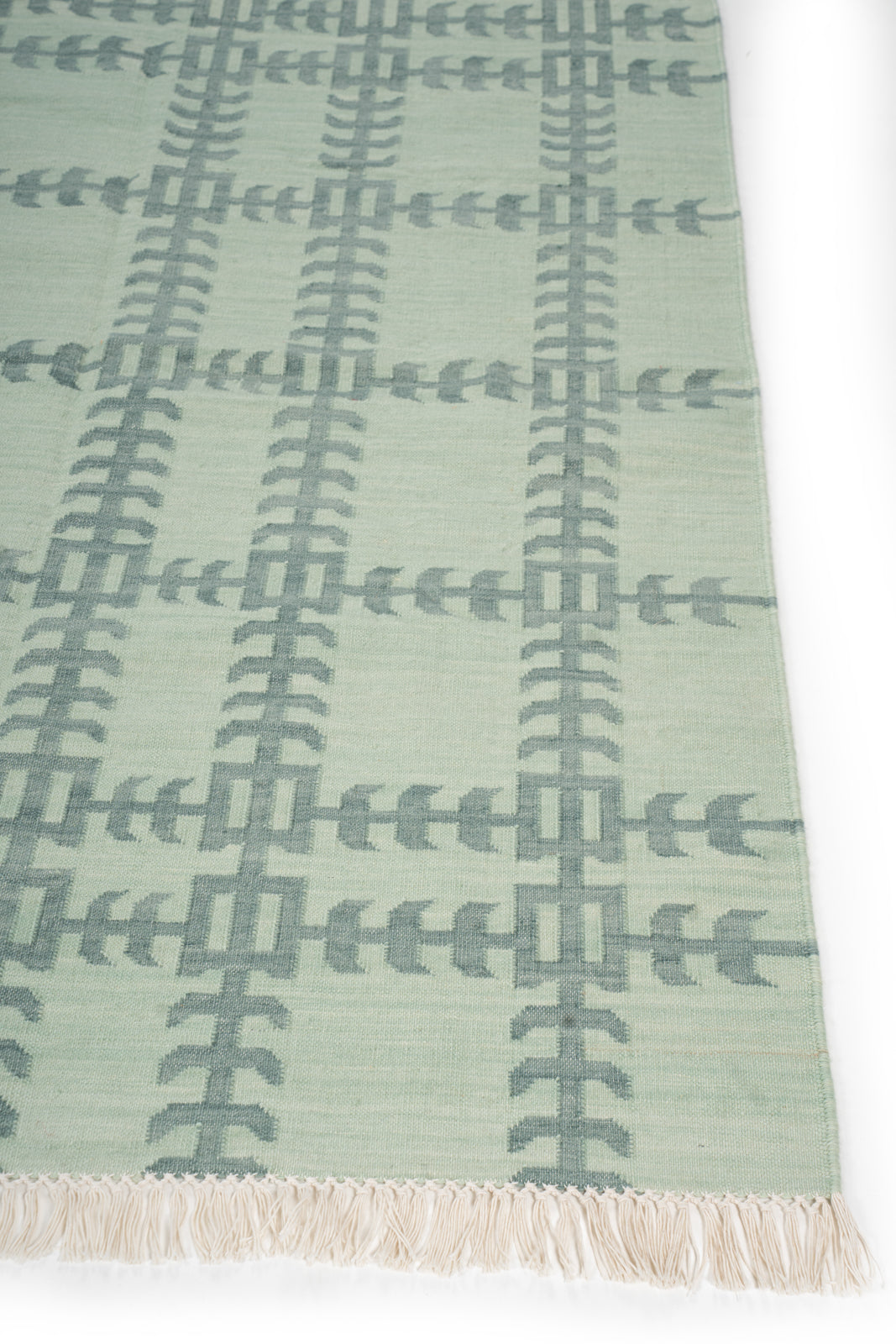 Gridline Flatweave Rug cotton rug styled in a living room interior with timber and linen