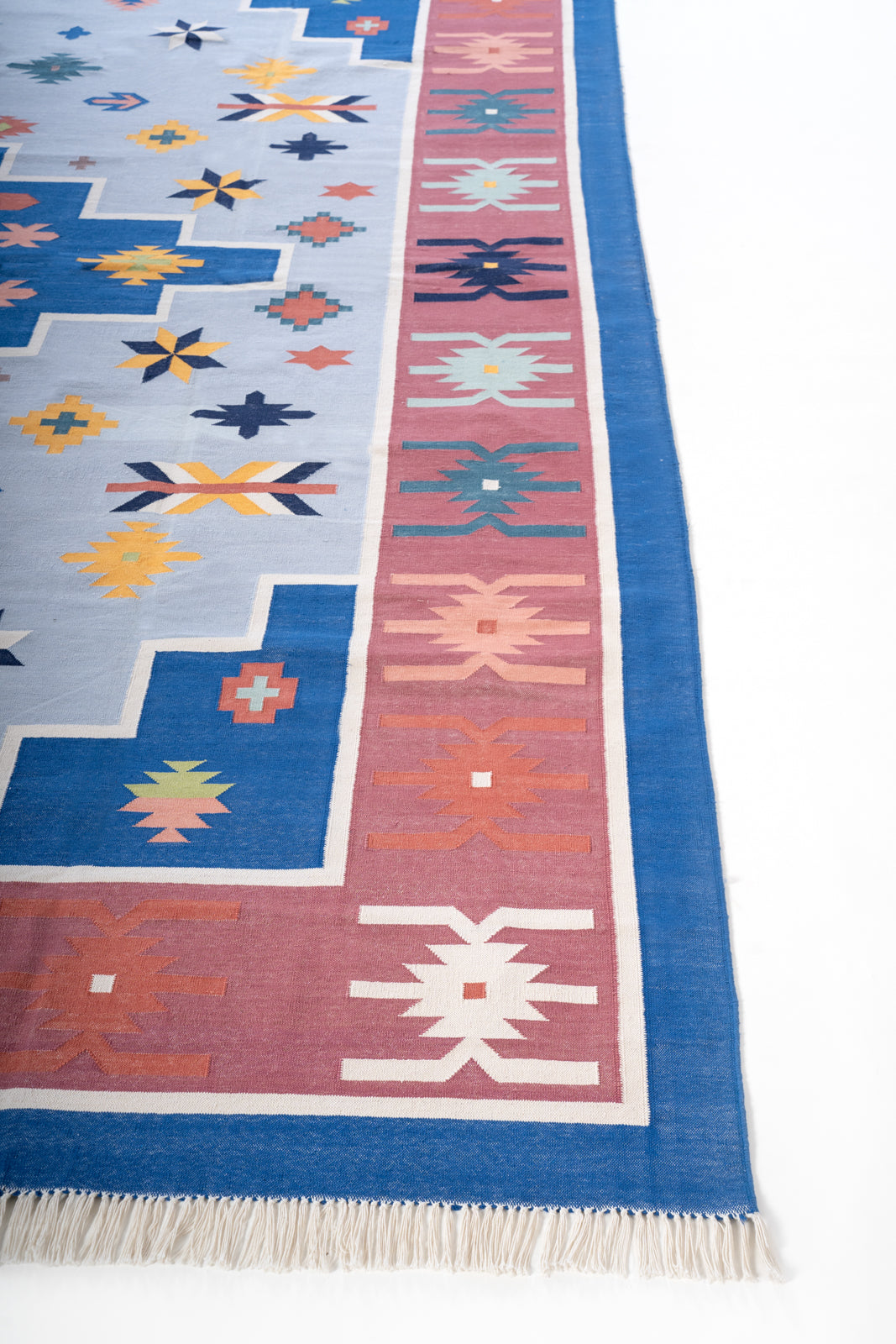 Indigo Heritage Vintage Dhurrie Rug cotton rug styled in a living room interior