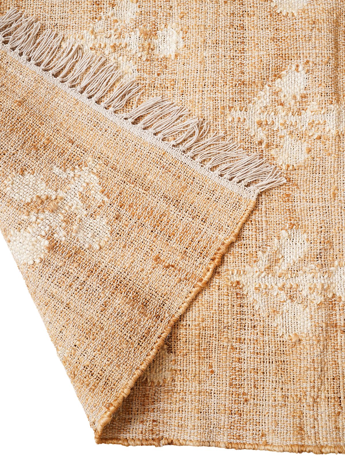 Ivory Blossom Jute Rug close-up showing the jute pile and floral motif