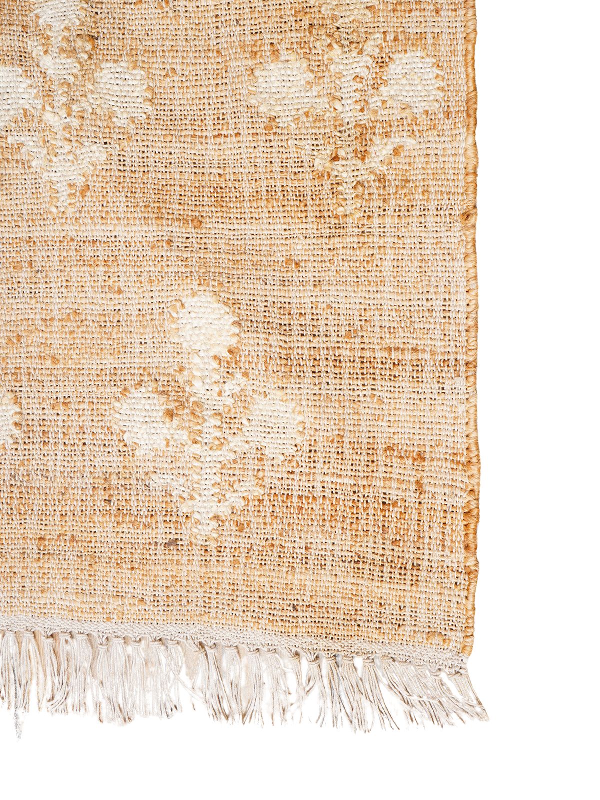 Ivory Blossom Jute Rug jute rug styled in a living room interior