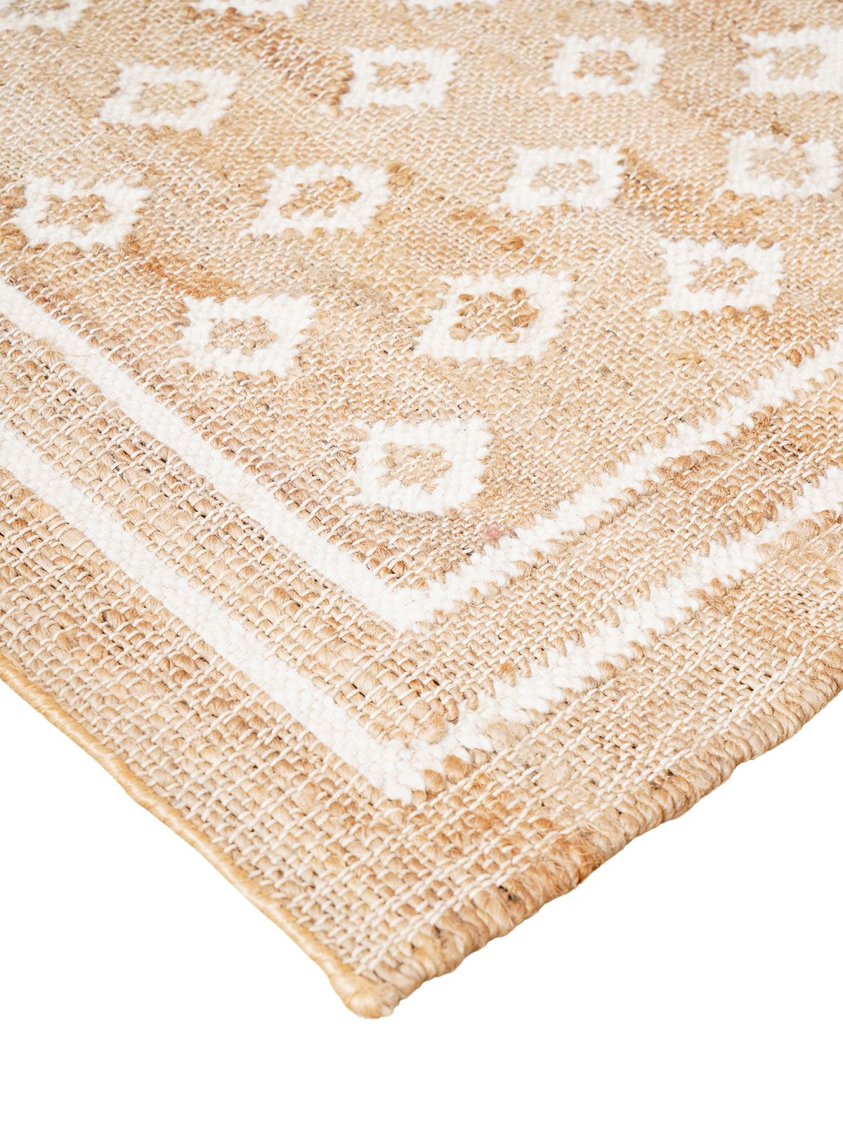 Ivory Diamond Sparkle Jute Rug close-up showing the jute weave and geometric motif