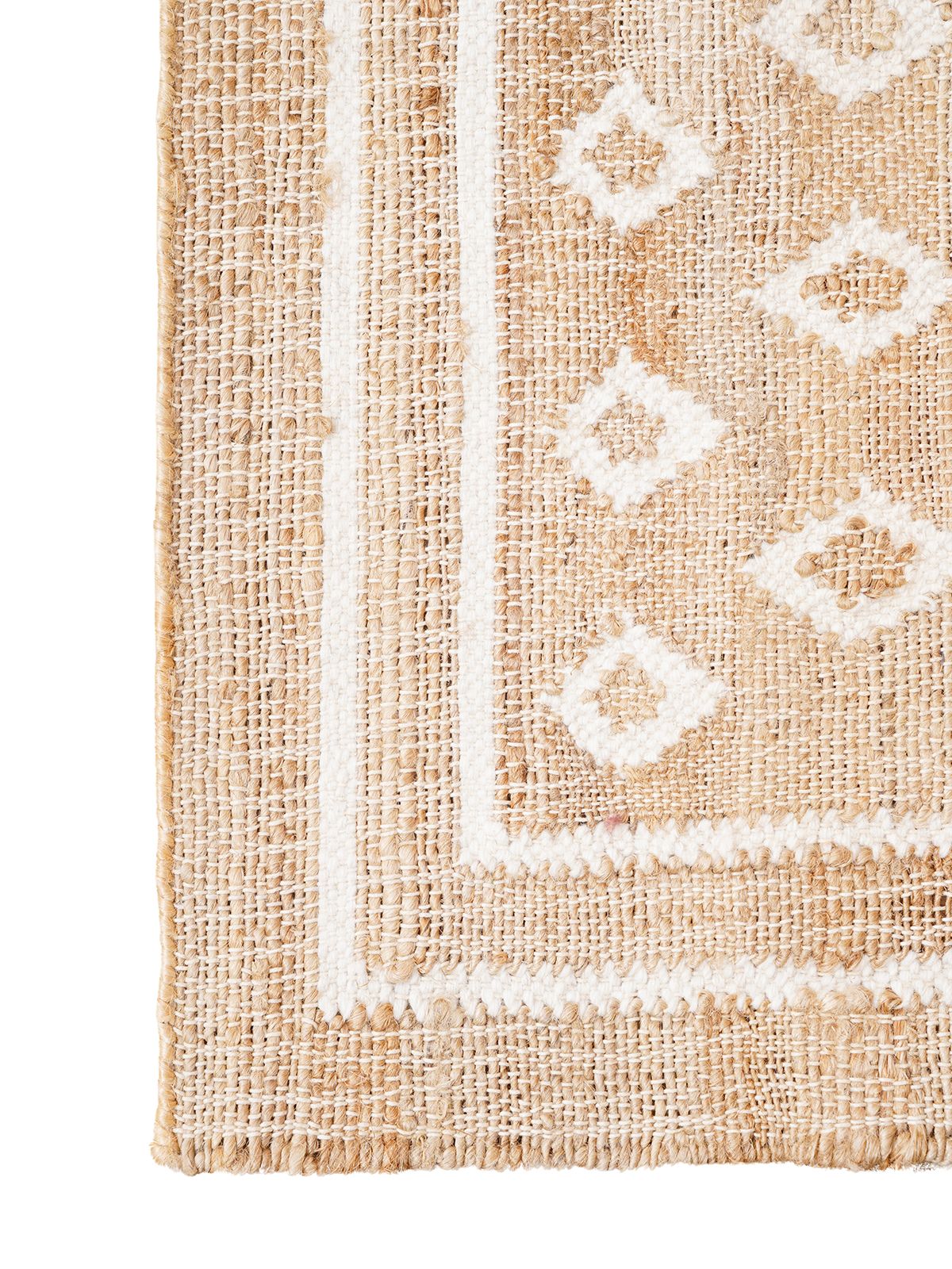 Ivory Diamond Sparkle Jute Rug jute rug styled in a living room interior
