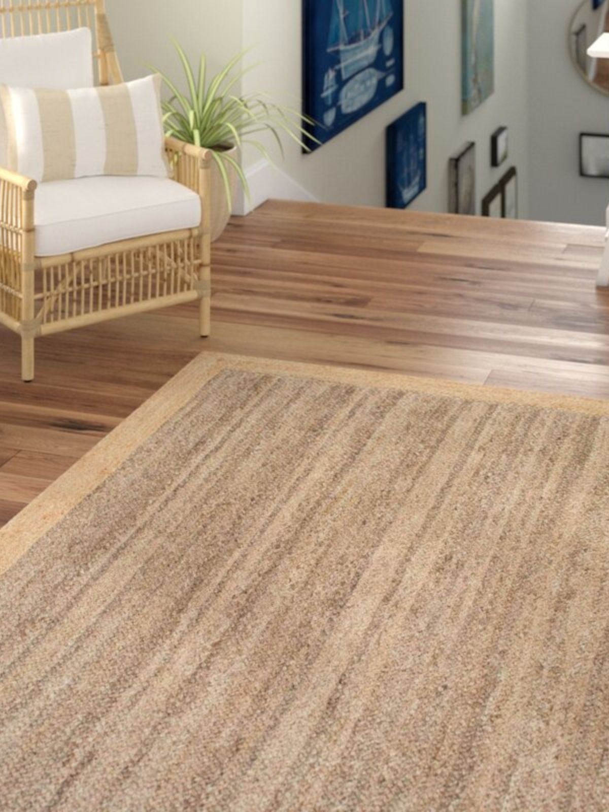 Juba jute bordered area rug-Brown jute rug styled in a living room interior