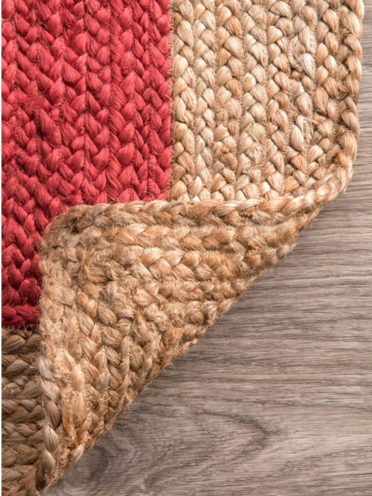 Juba jute bordered area rug-Red detail of the striped jute surface and edge finishing