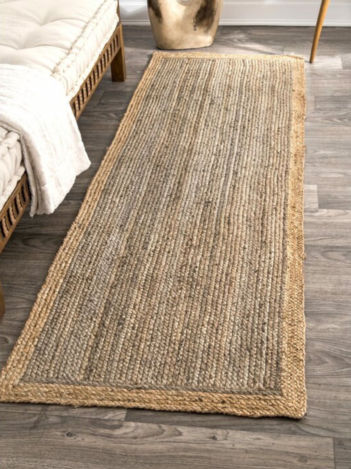 Juba Jute Bordered Runner-Brown jute stair runner styled on a staircase in a designed interior