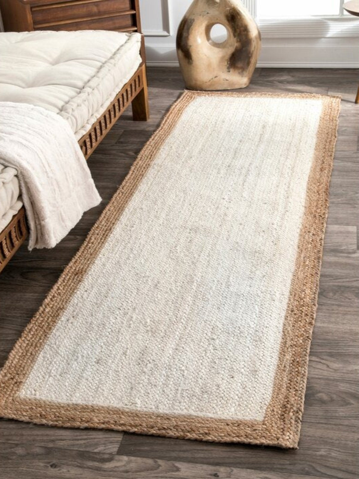 Juba Jute Bordered Runner-Ivory jute stair runner styled on a staircase in a designed interior