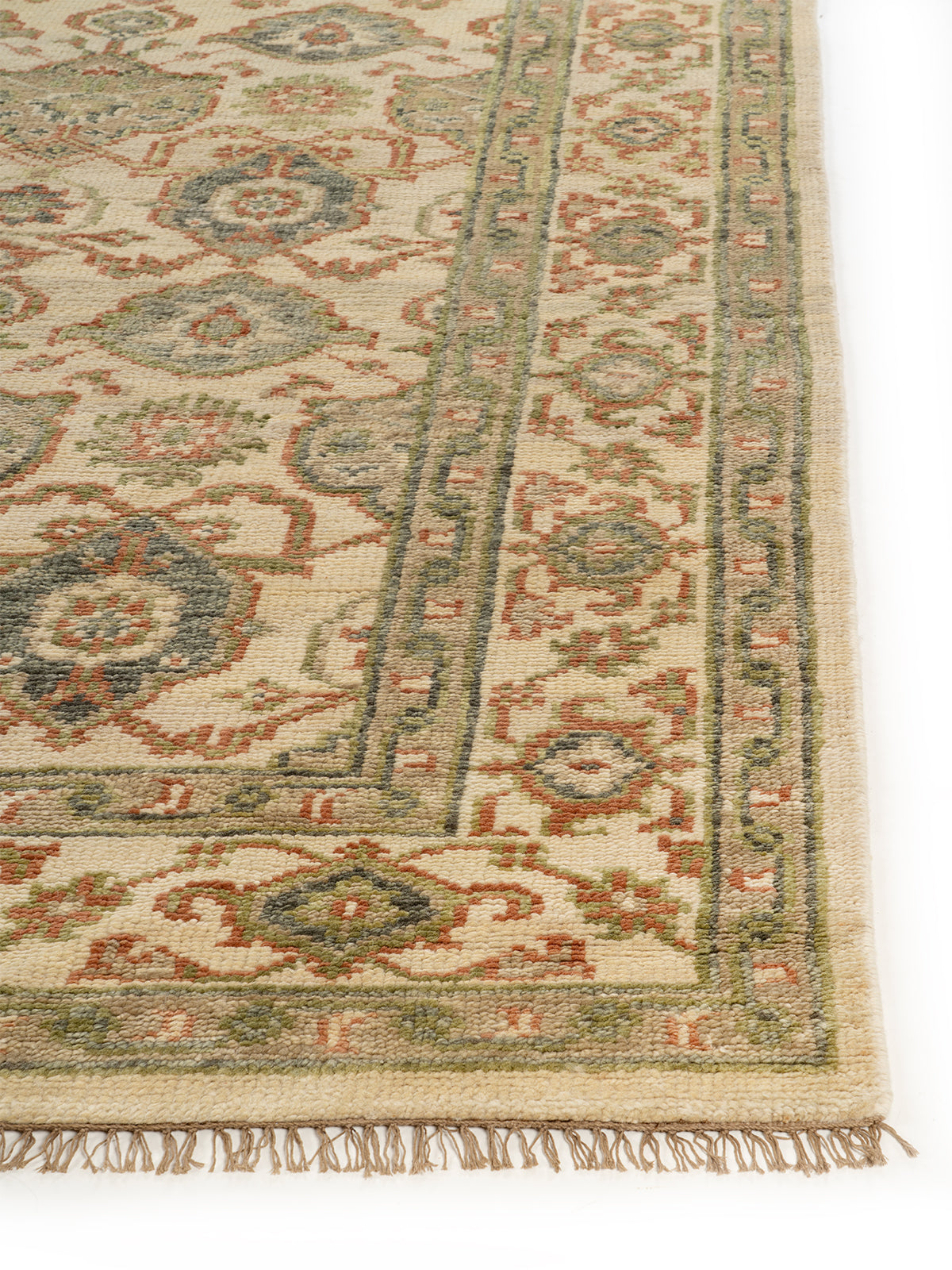 Khorasan Olive handspun wool rug styled in a living room interior