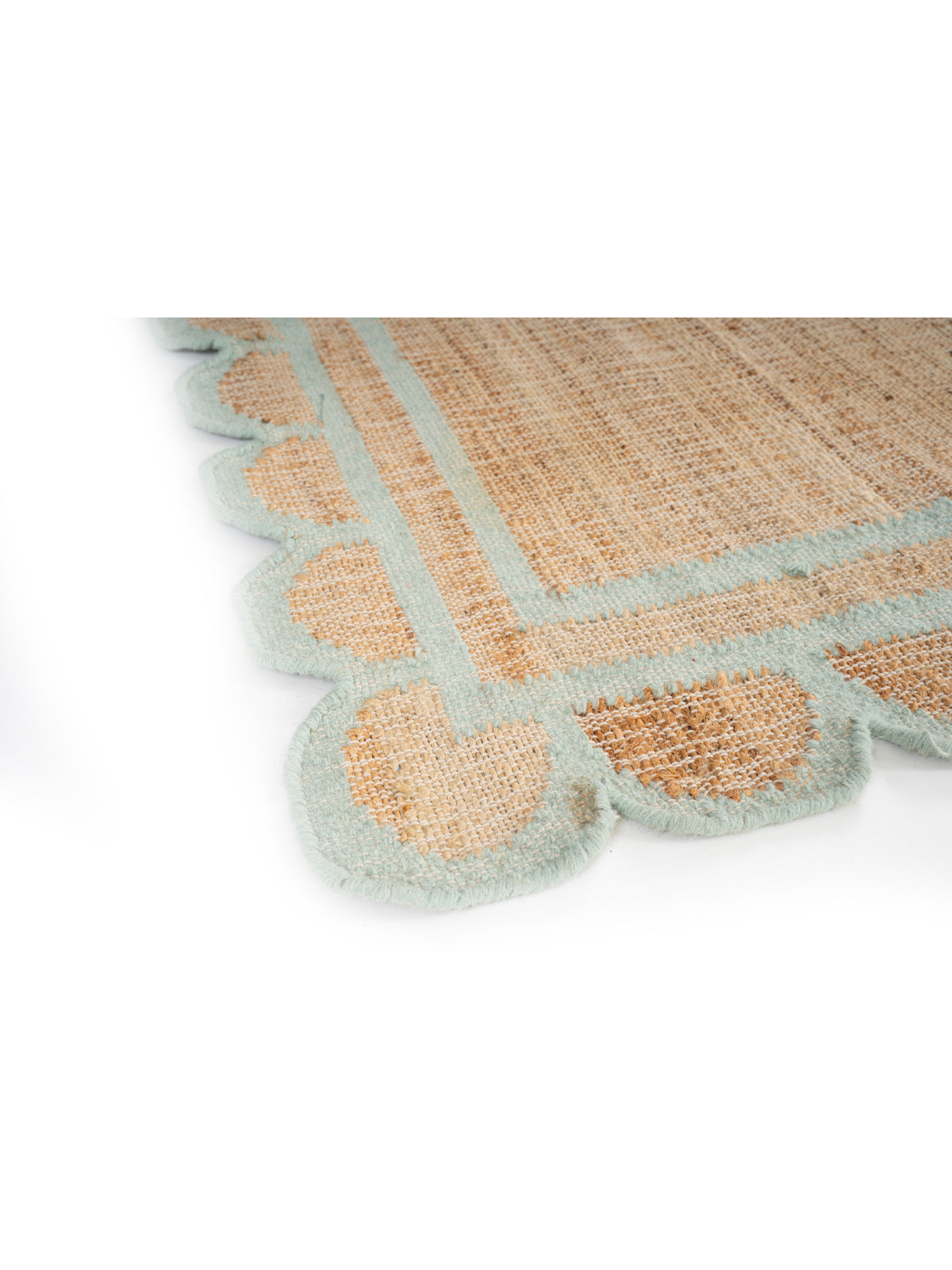 Kigali scalloped hemp rug-Mint green close-up showing the hemp weave and surface texture