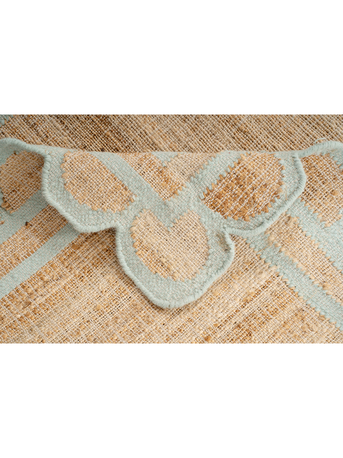 Kigali scalloped hemp rug-Mint green detail showing the textured hemp surface and finishing