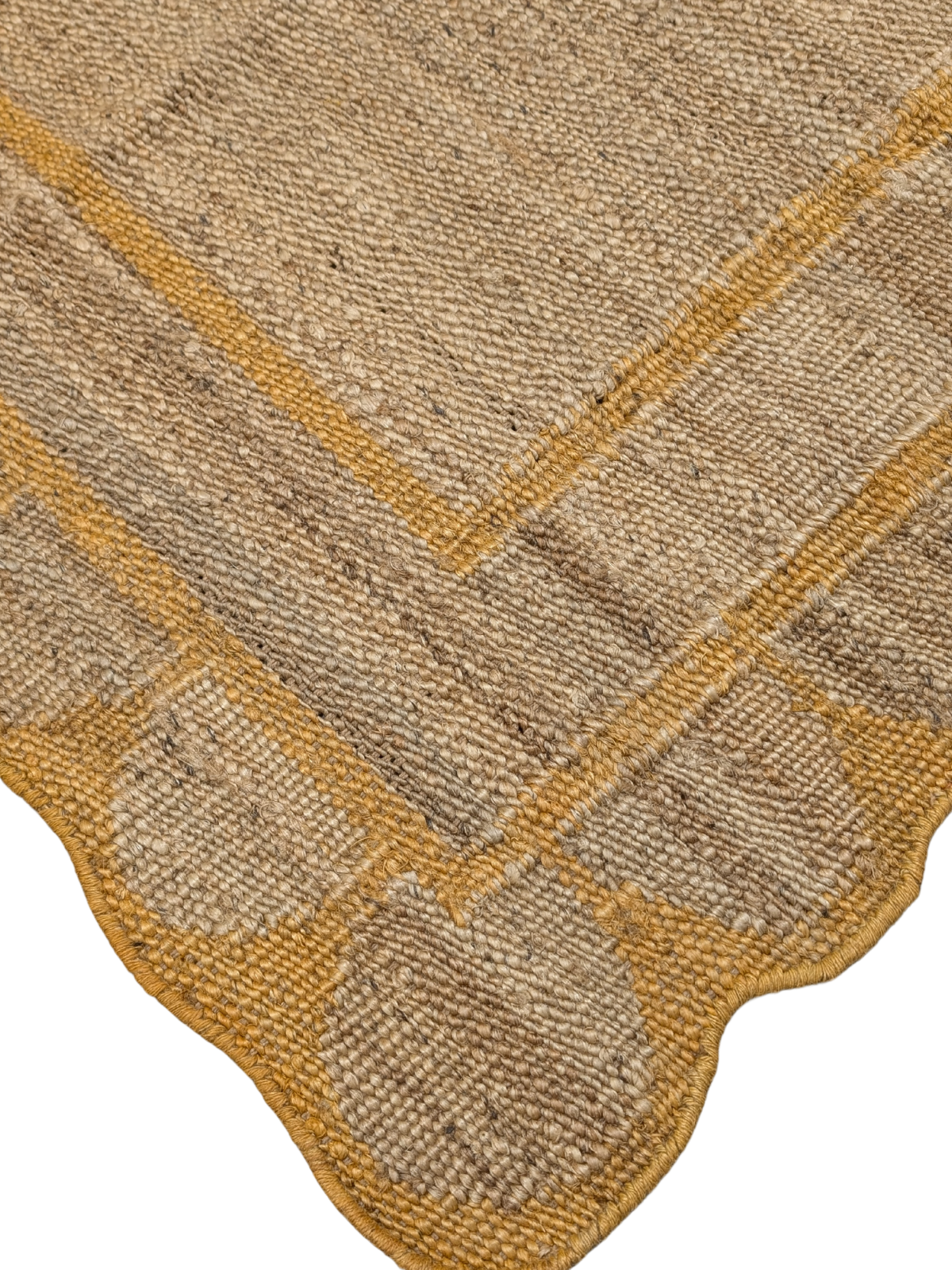 Kigali scalloped hemp rug- Mustard close-up showing the hemp weave and surface texture