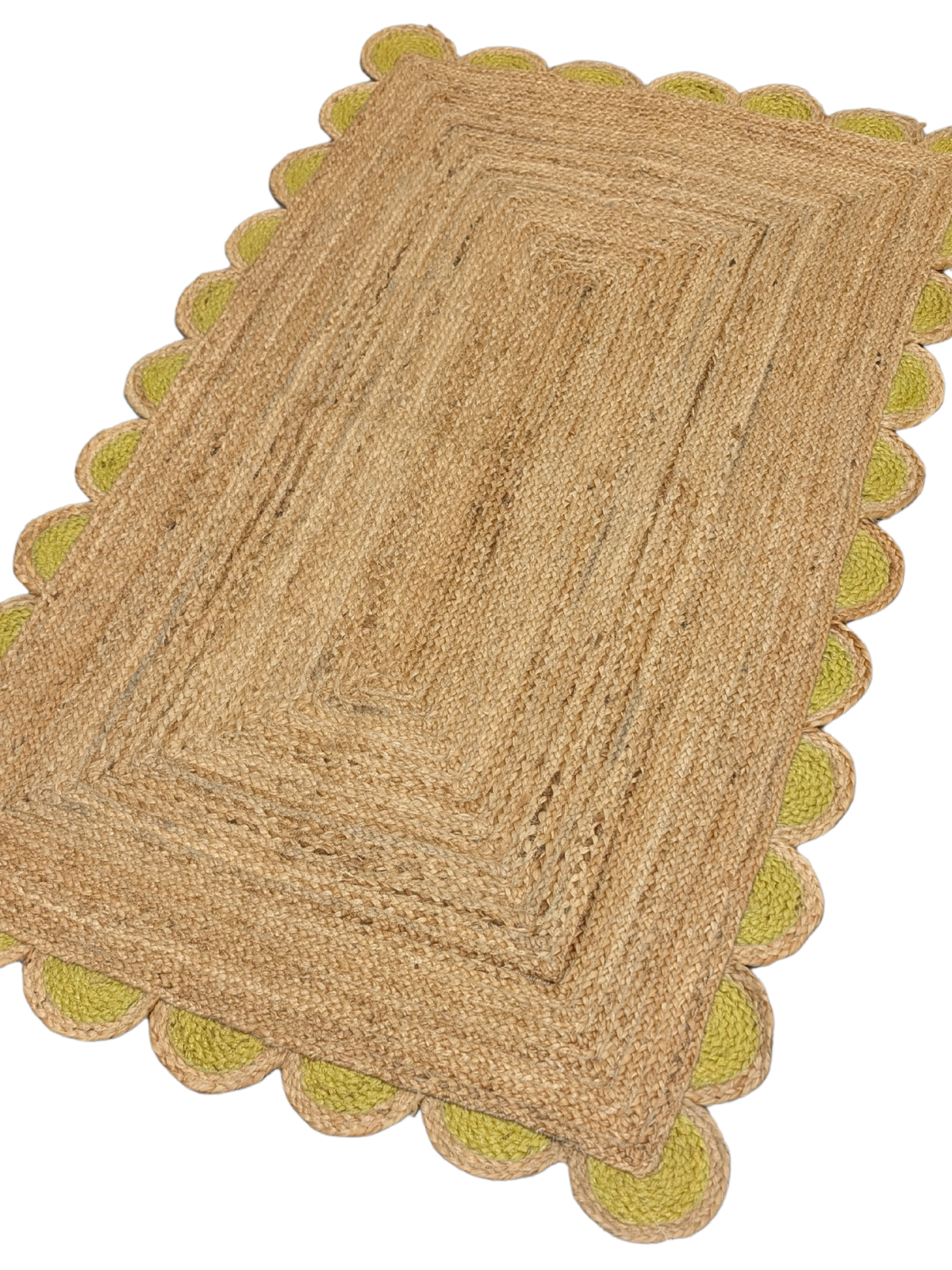 Kribi scalloped jute area rug-Leaf green jute rug styled in a living room interior