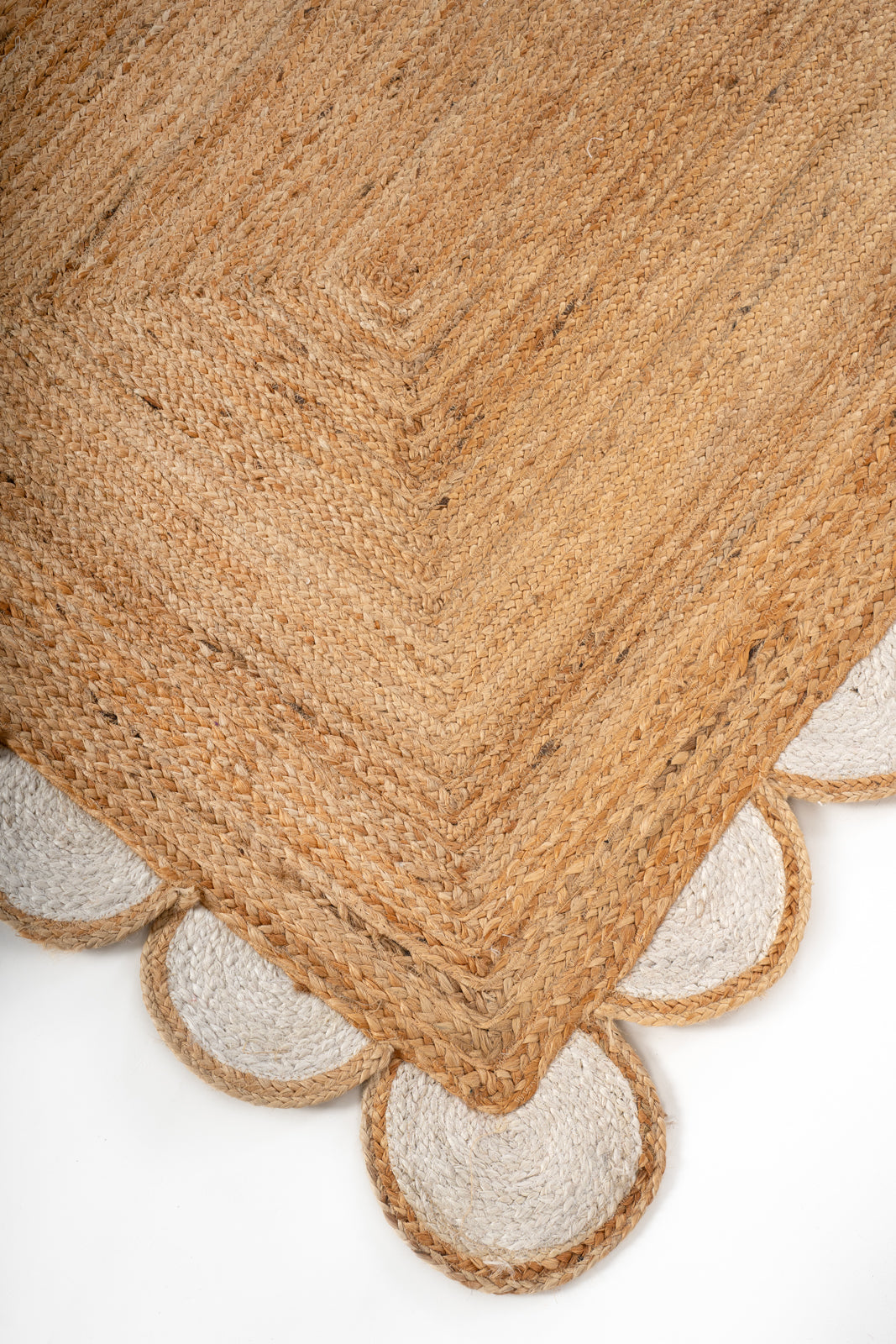 Kribi scalloped jute area rug-White close-up showing the jute weave and surface texture