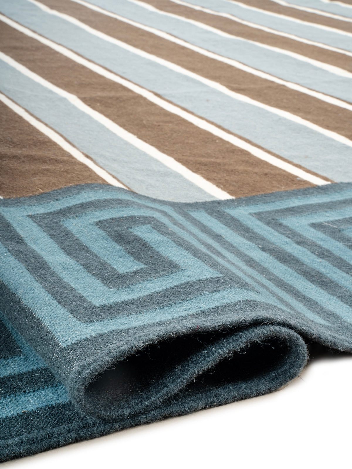 Kyma Key Border Rug - edge detail showing wool finishing