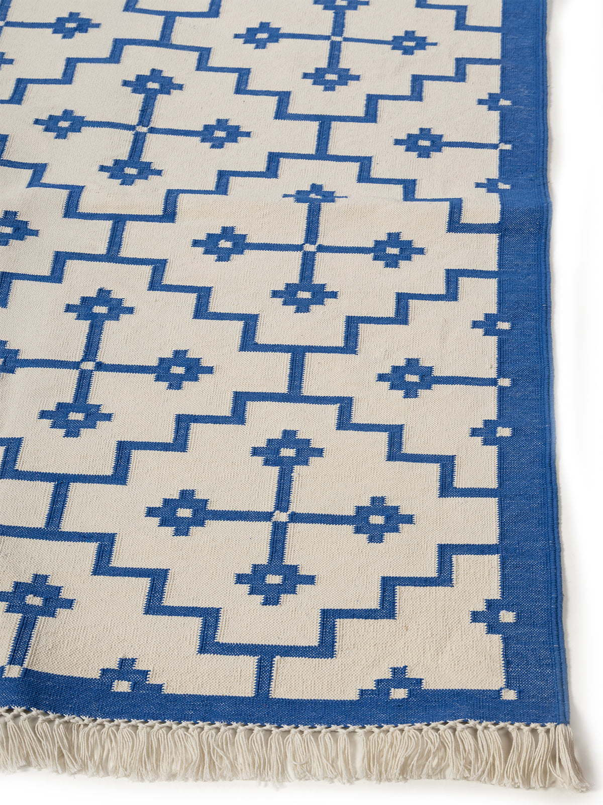 Labyrinth Weave Rug cotton rug styled in a living room interior
