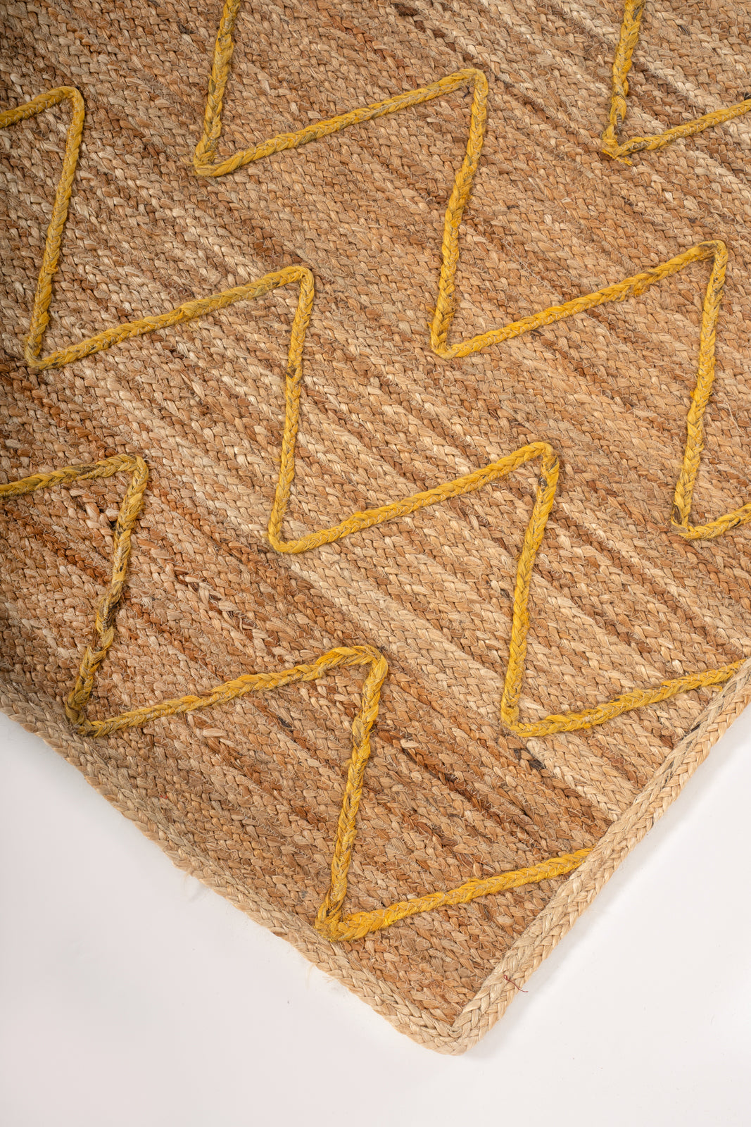 Lagos Zig Zag Braided Rug-Yellow close-up showing the jute weave and geometric motif