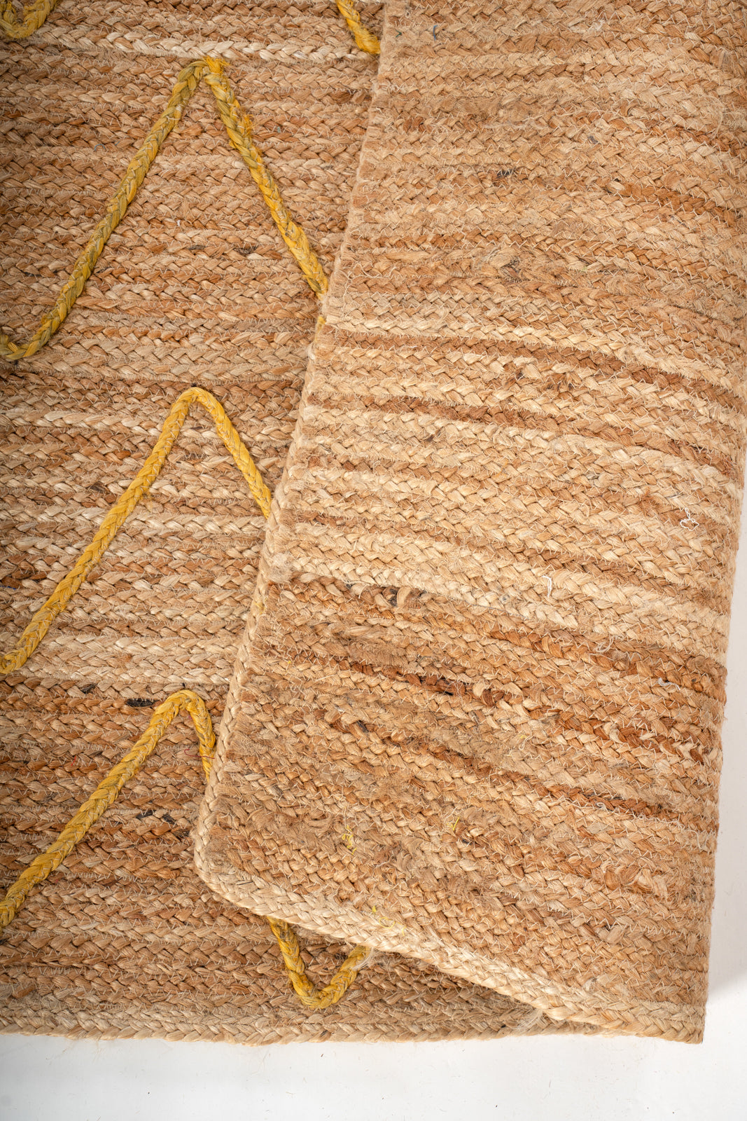 Lagos Zig Zag Braided Rug-Yellow detail of the geometric pattern in jute