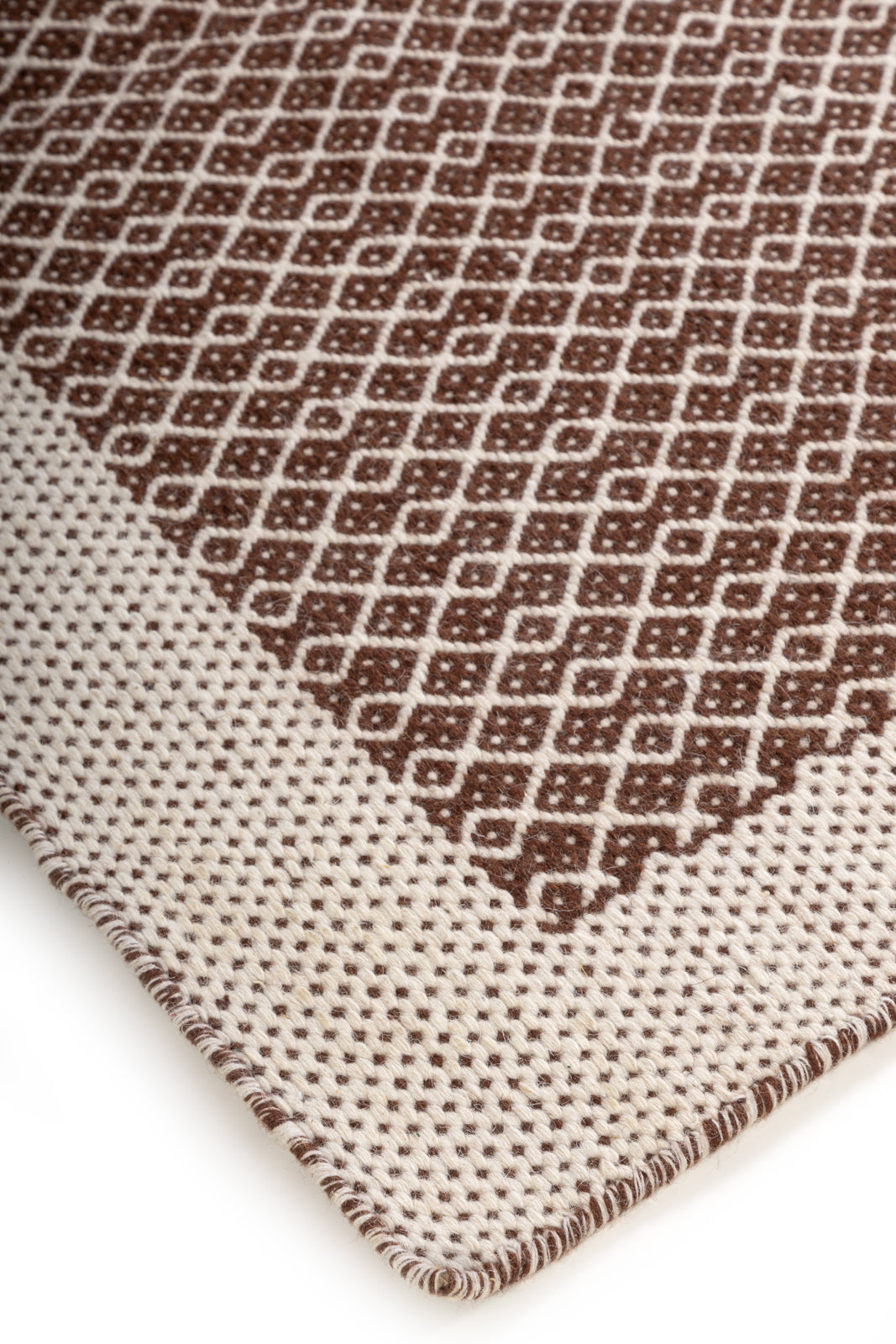 Lancet Wool Rug close-up showing the wool weave and geometric motif