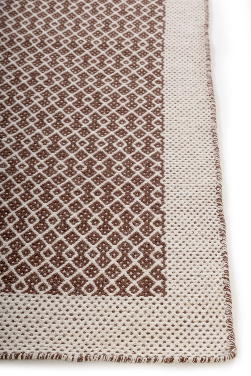 Lancet Wool Rug wool rug styled in a living room interior