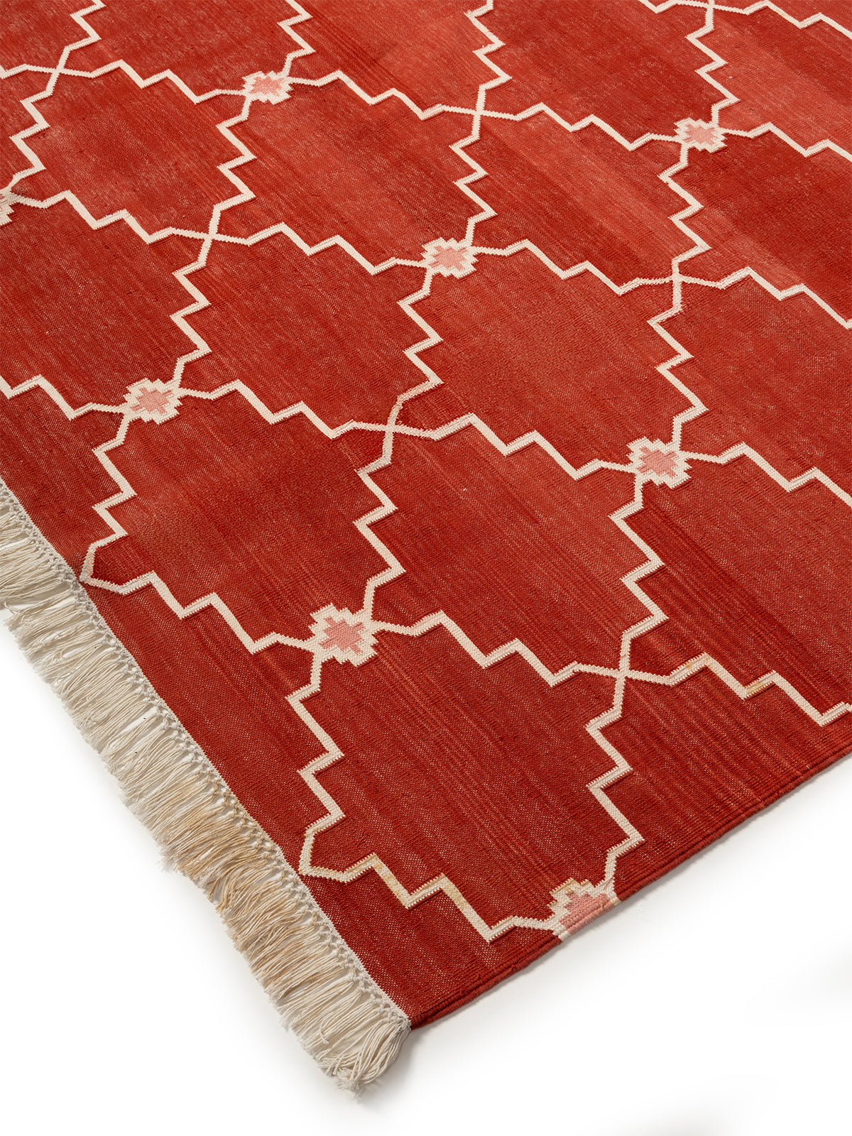 Lattice Haven Rug close-up showing the jute weave and geometric motif