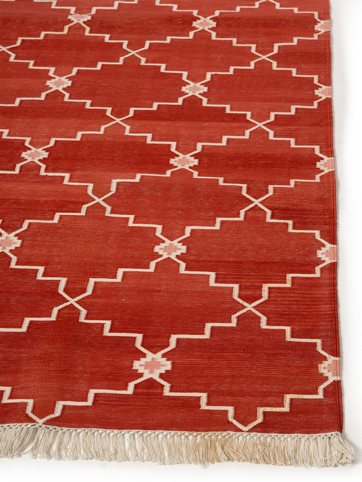 Lattice Haven Rug jute rug styled in a living room interior