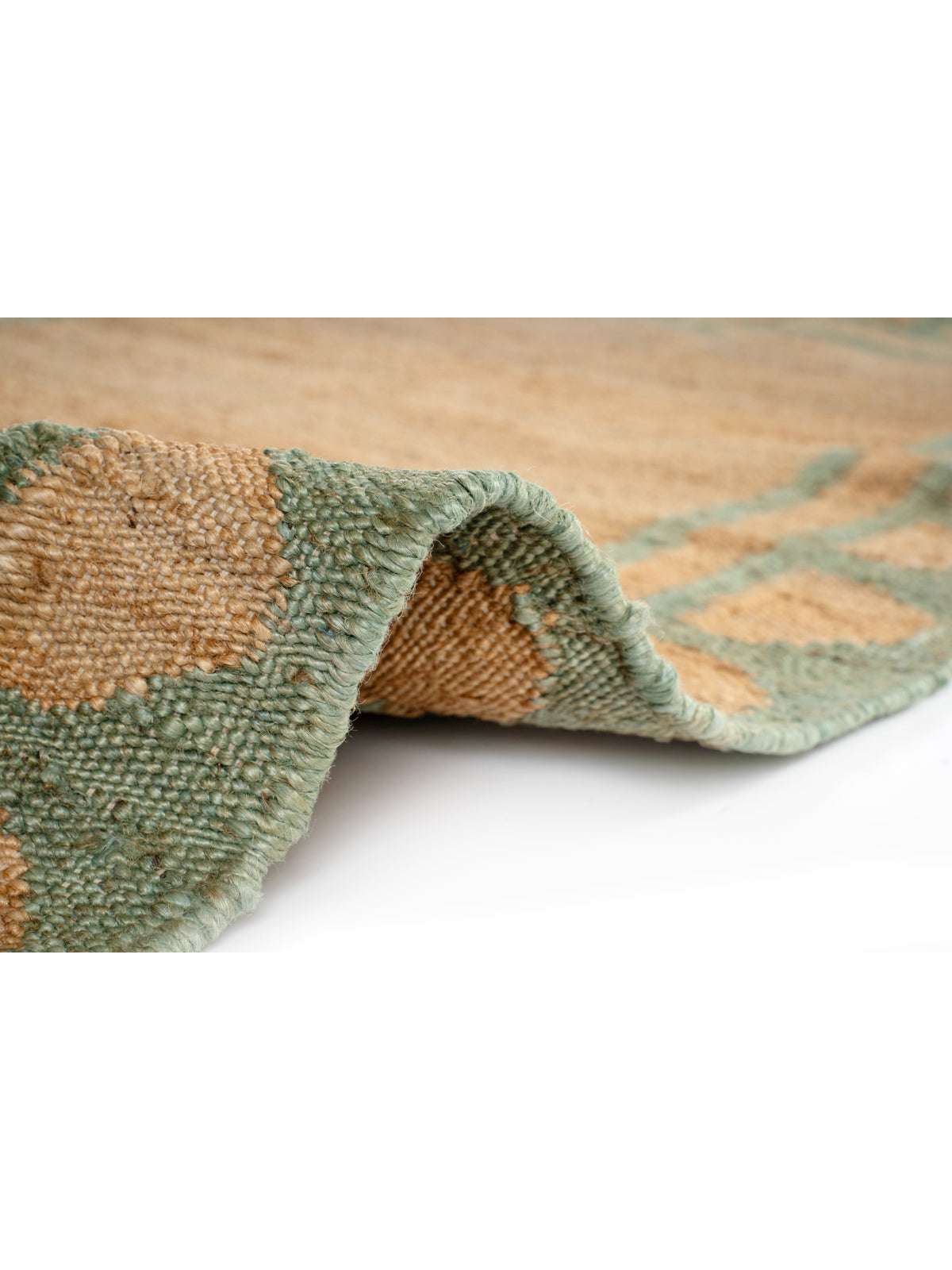 Lira scalloped hemp rug-Green detail showing the textured hemp surface and finishing
