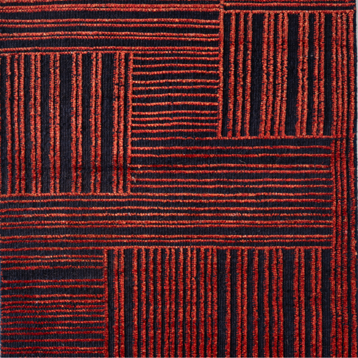 Lithos Edit : Magma Lane bamboo silk rug in red tones
