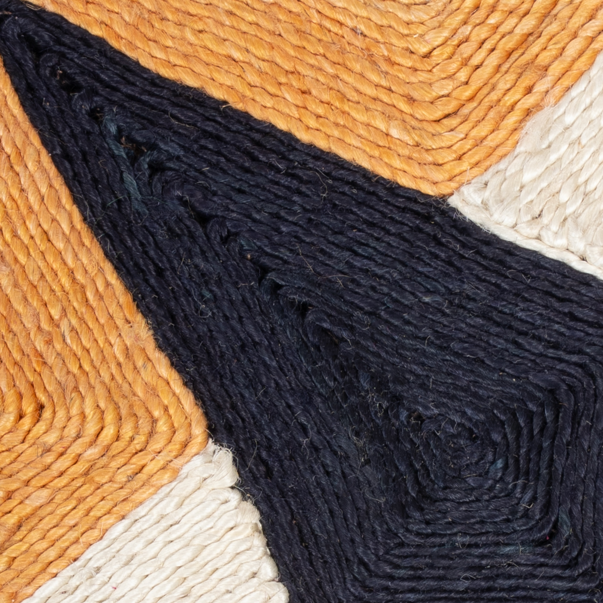 Looma : Bloom close-up showing the mixed fibre weave and geometric motif