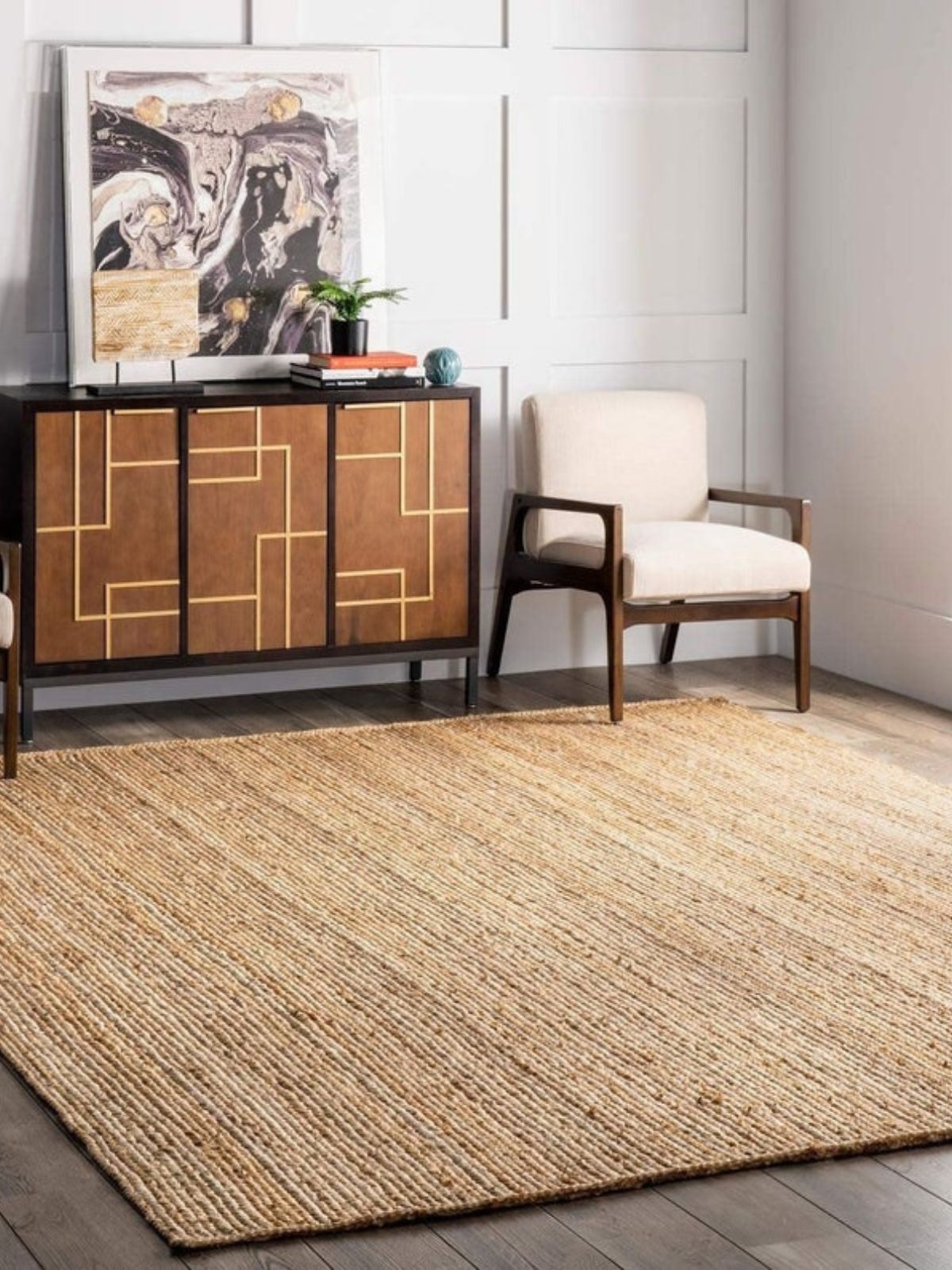 Lusaka natural jute braided area rug jute rug styled in a living room interior