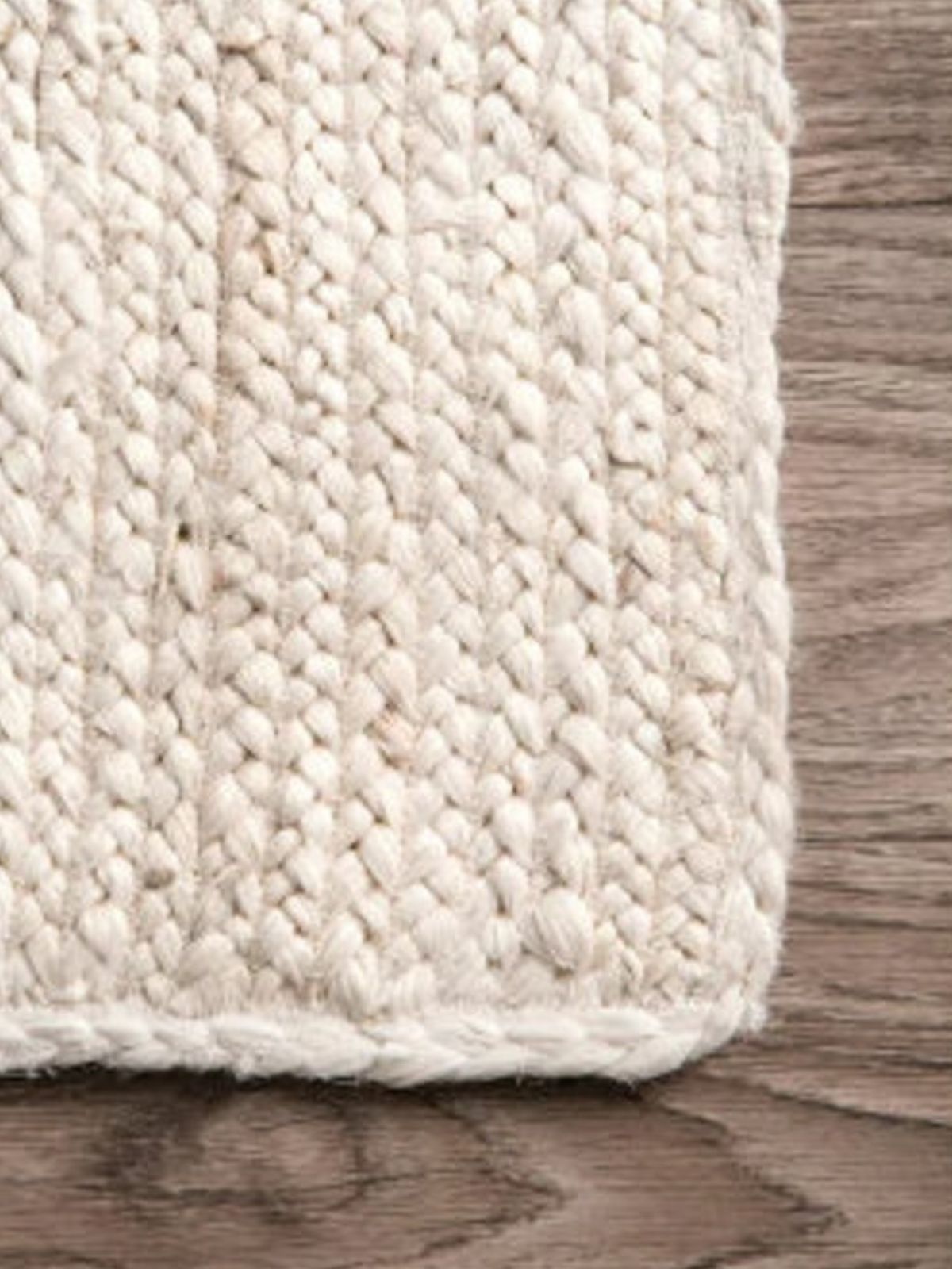 Lusaka Natural Jute Braided Runner-Ivory - jute runner laid in a hallway view