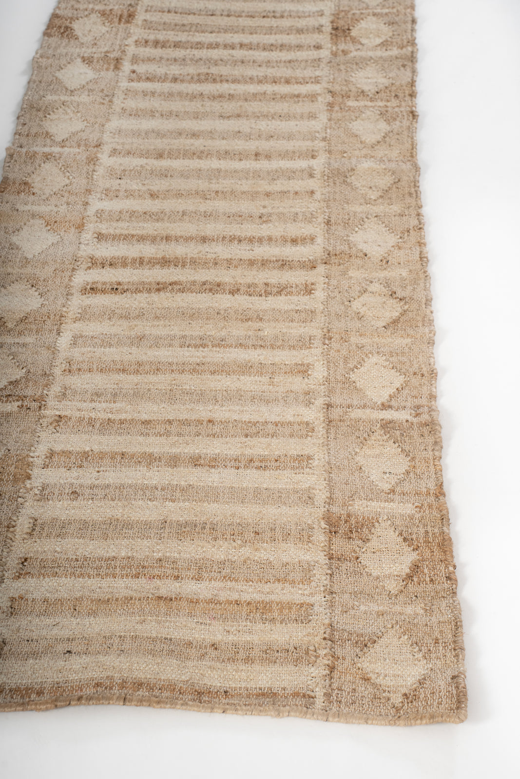 Malabar Coastal Jute Runner - jute runner laid in a hallway view