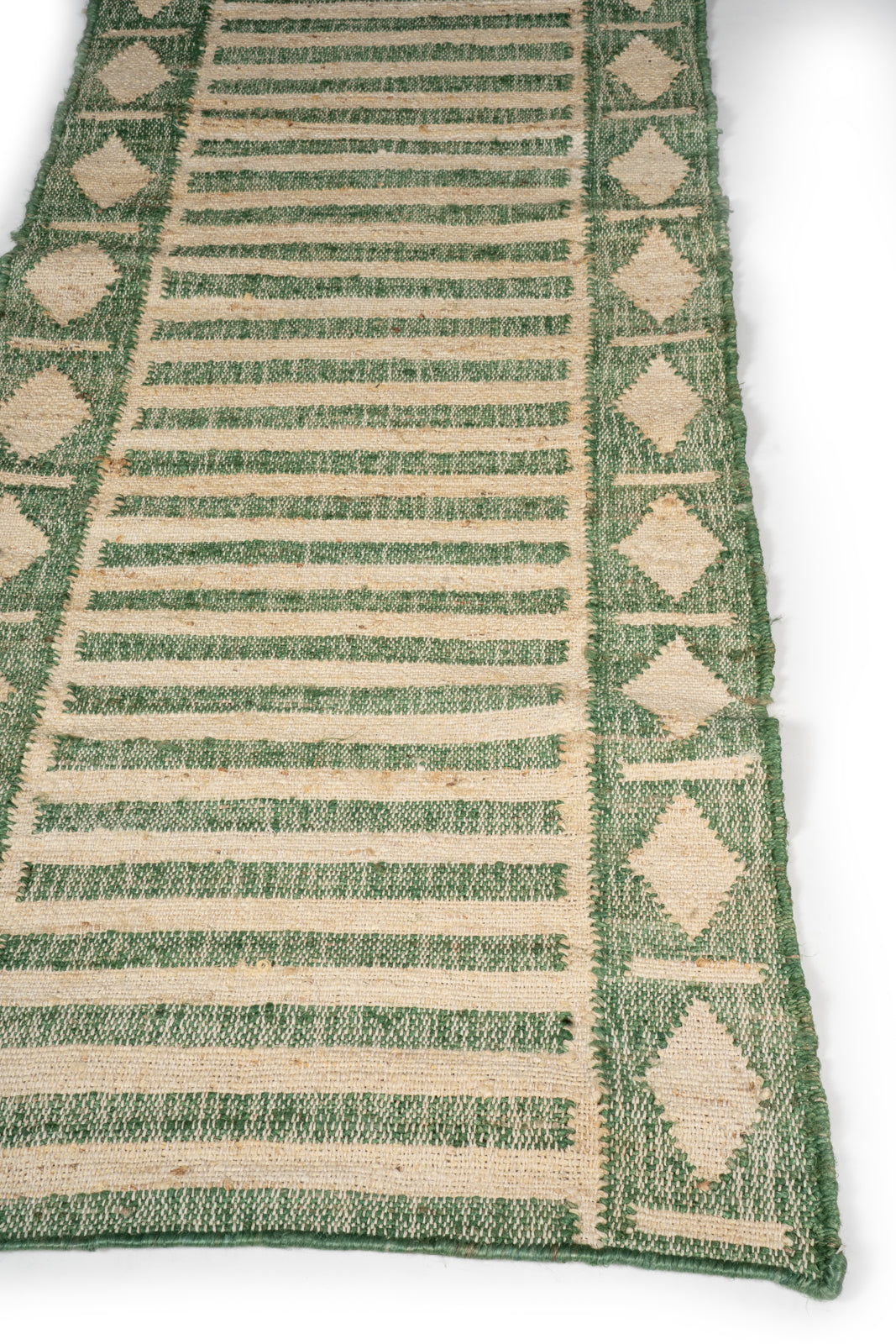 Malabar Coastal Jute Runner-Green - jute runner laid in a hallway view