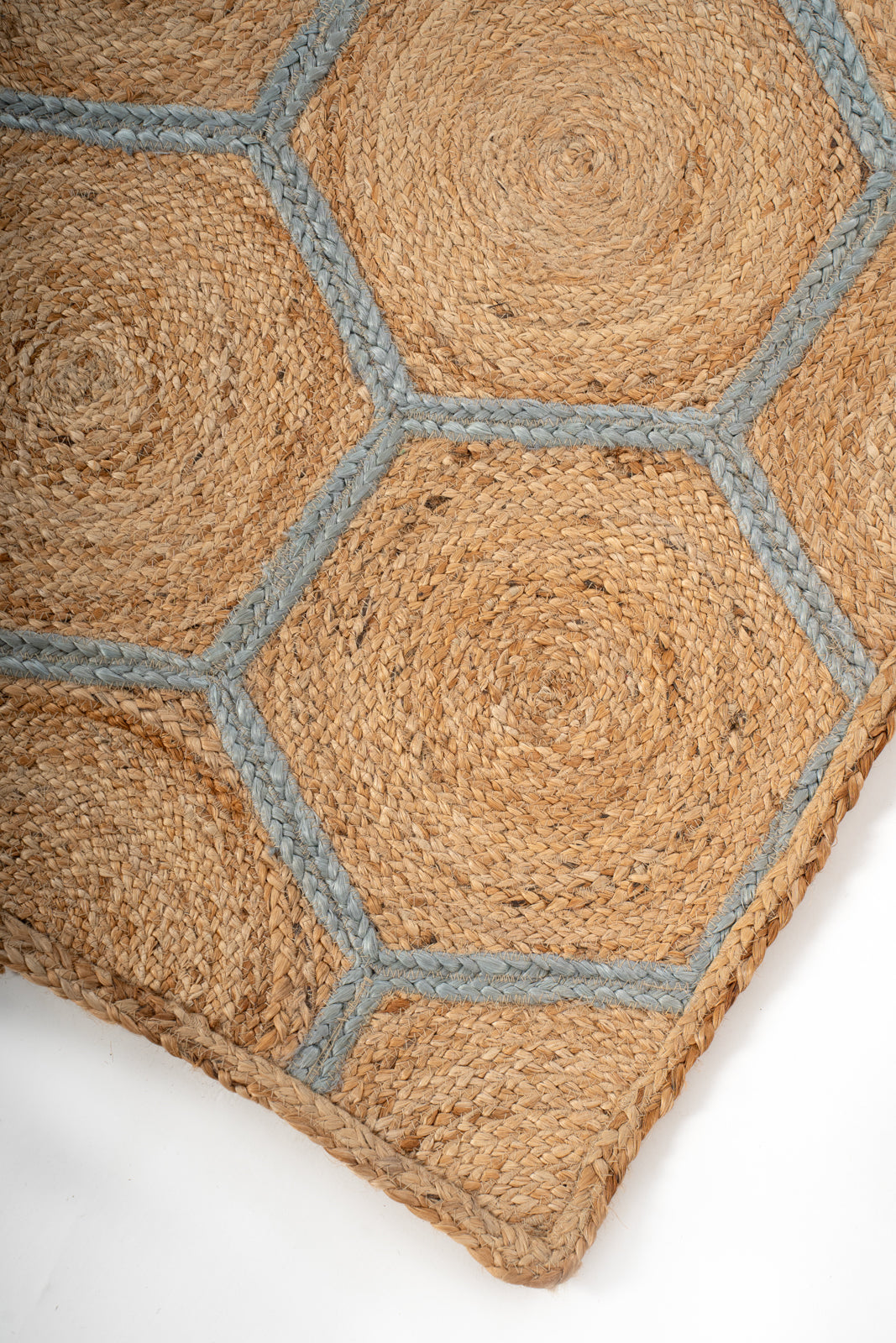Malabo jute braided area rug close-up showing the jute weave and surface texture