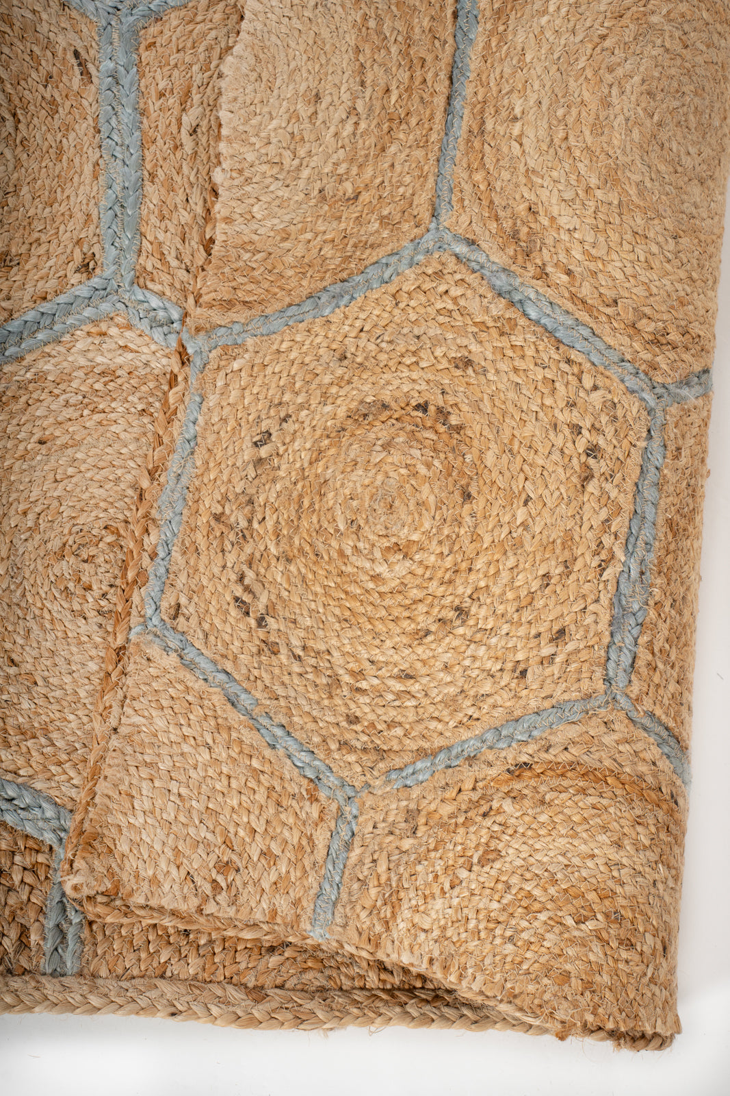 Malabo jute braided area rug detail showing the textured jute surface and finishing