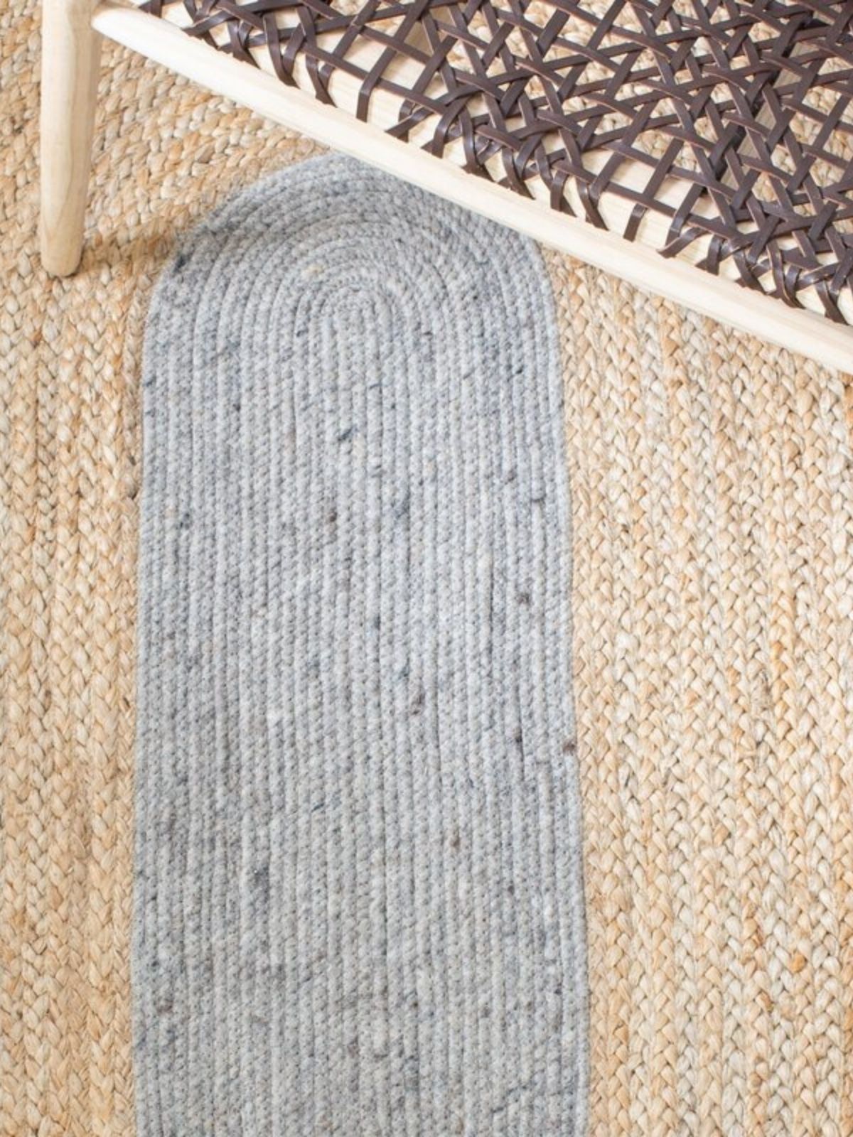 Maseru jute bordered oval area rug close-up showing the jute weave and striped pattern