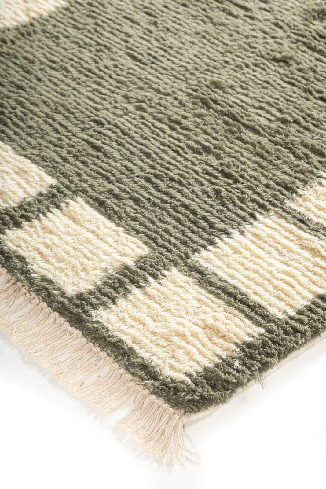 Meadow Frame Wool Rug close-up showing the wool pile and floral motif