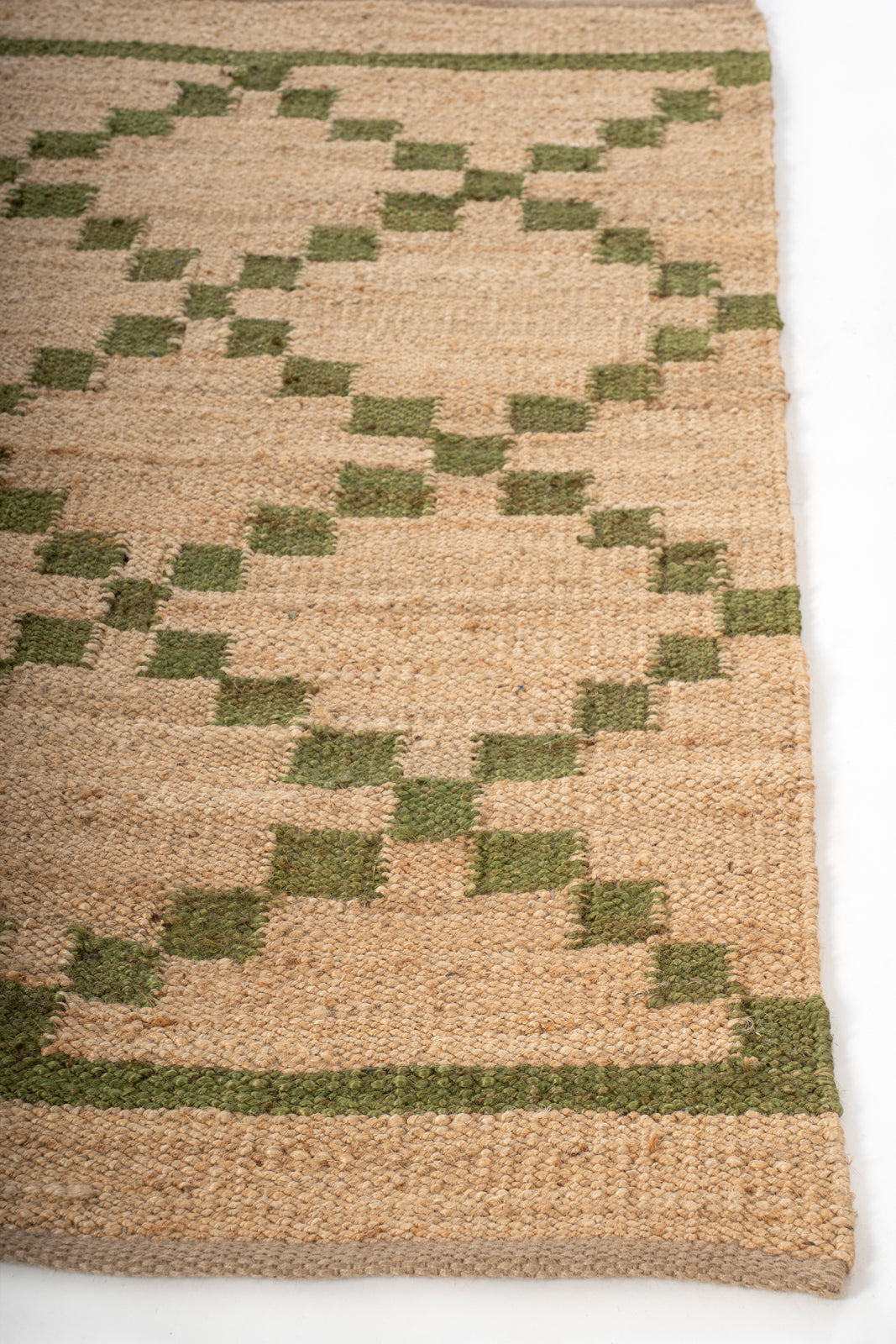 Meadow Jute Rug jute rug styled in a living room interior