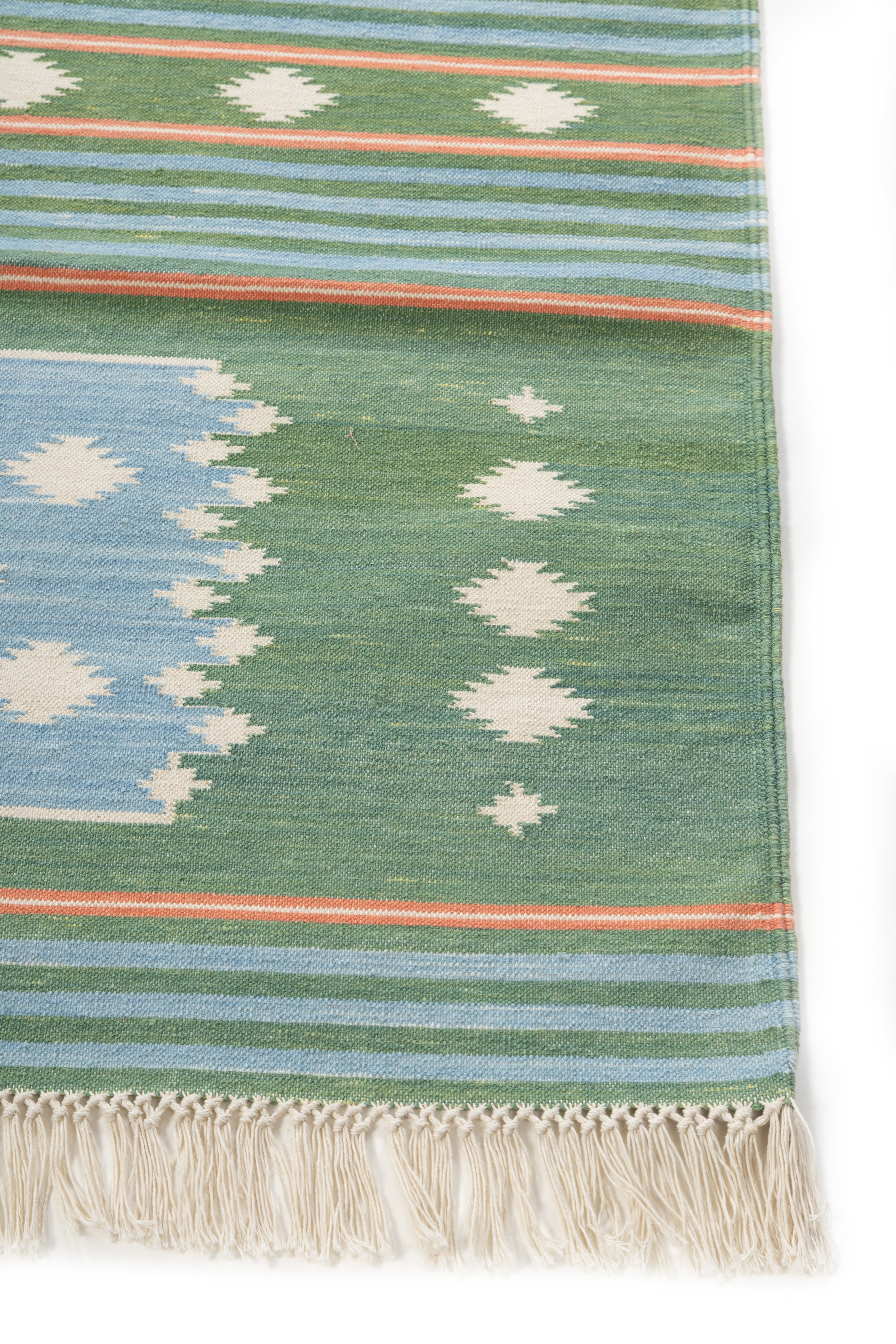 Meadow Mist Dhurrie Rug cotton rug styled in a living room interior