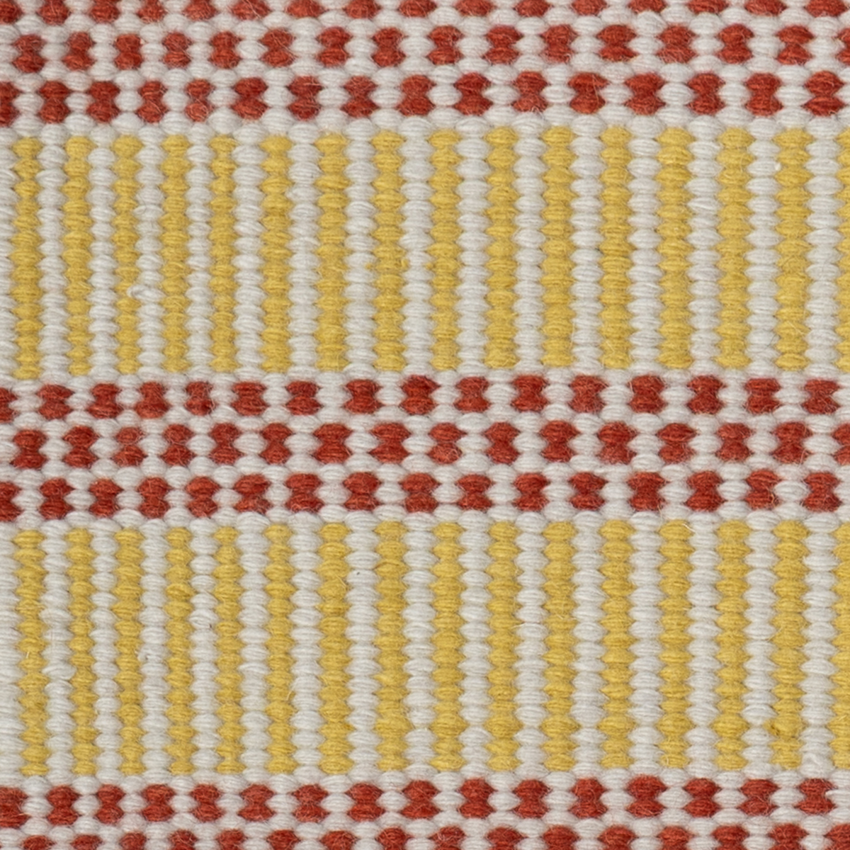 Mehr Marigold close-up showing the wool pile and floral motif