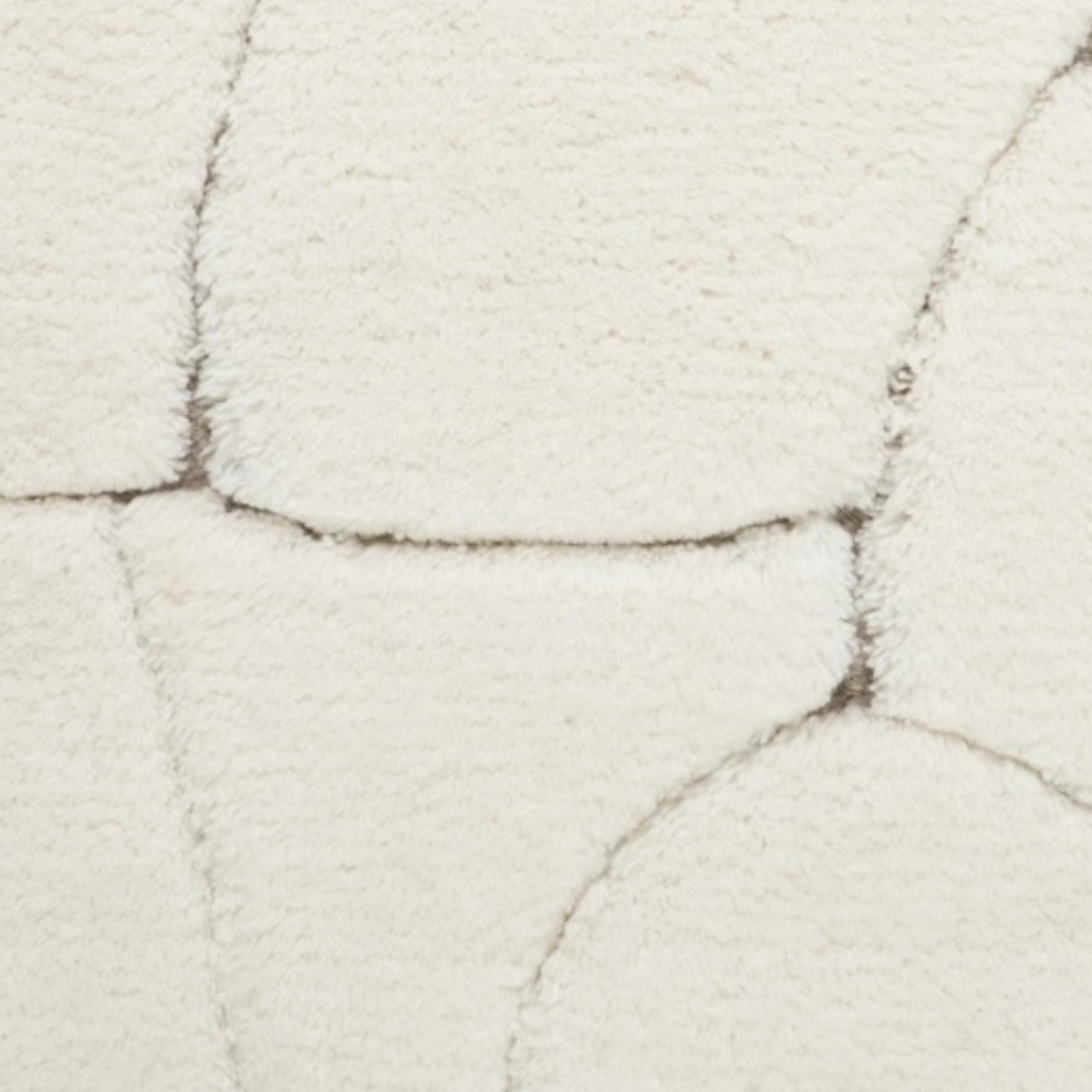 Mehran : Calcite close-up showing the wool weave and surface texture