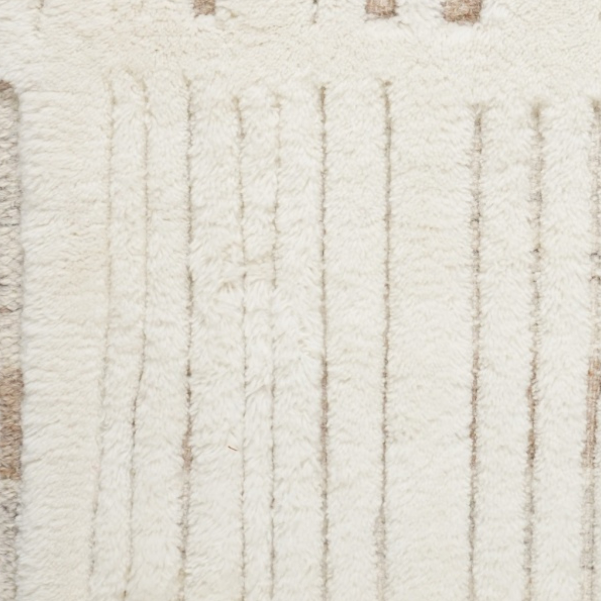 Mehran : Travertine close-up showing the wool weave and surface texture