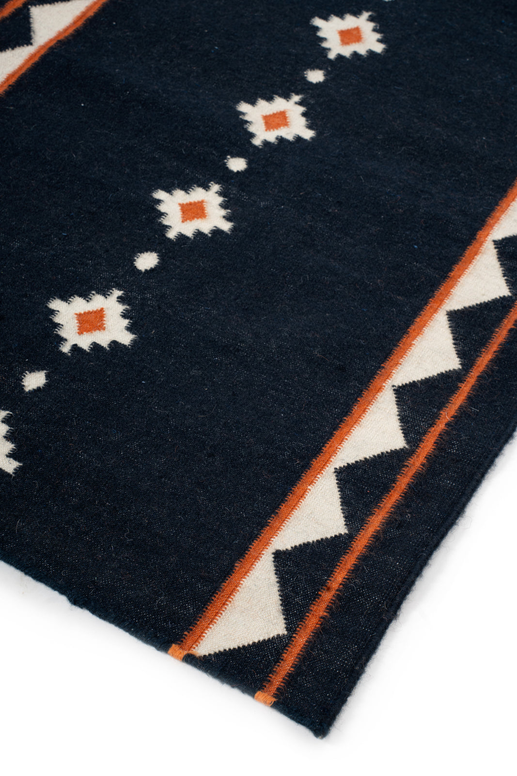 Midnight Ember Dhurrie Runner close-up showing the cotton weave and stripes surface
