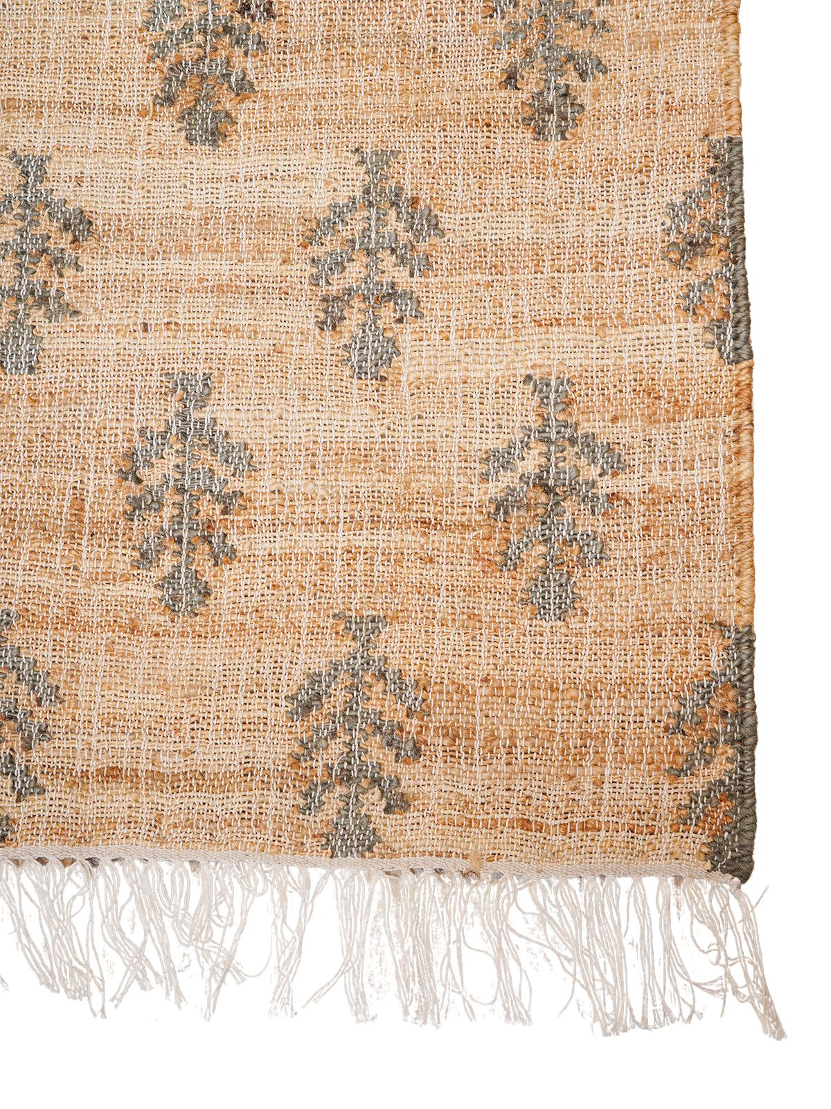 Midnight Foliage Jute Rug jute rug styled in a living room interior