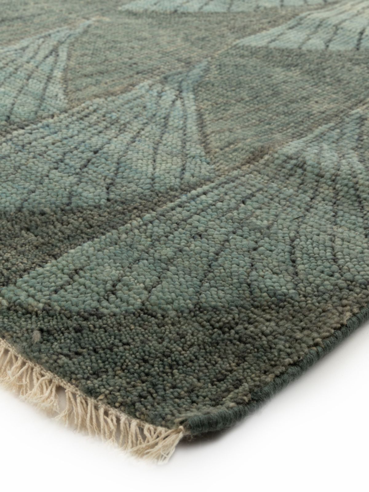 Misty harbor handknotted rug close-up showing the wool weave and surface texture