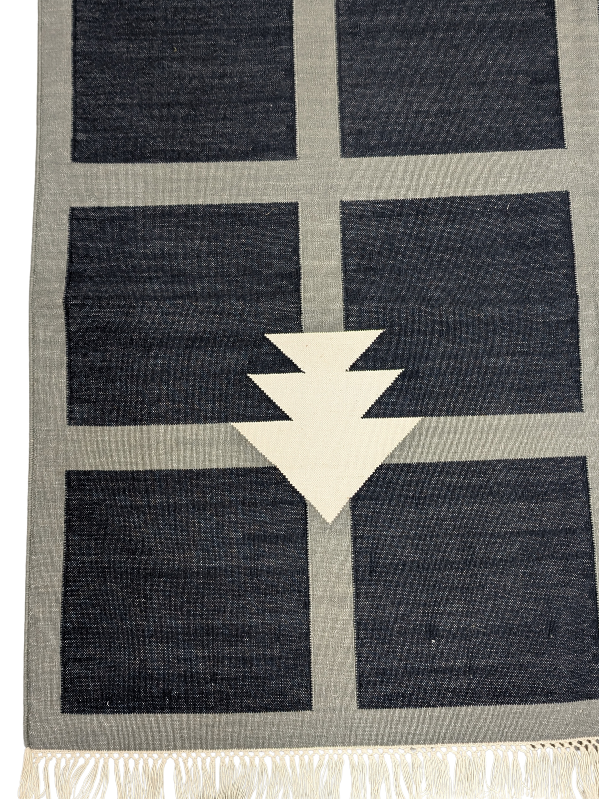 Modern Nomad Rug close-up showing the cotton weave and traditional motif