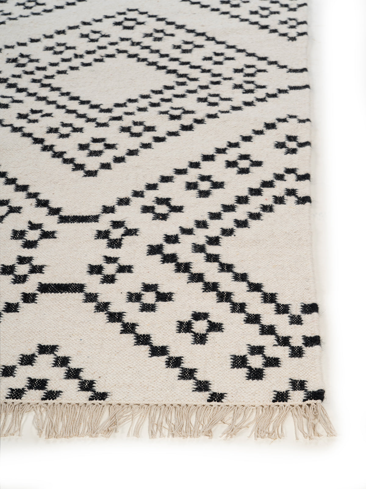 Monochrome Berber Flatweave Rug wool rug styled in a living room interior