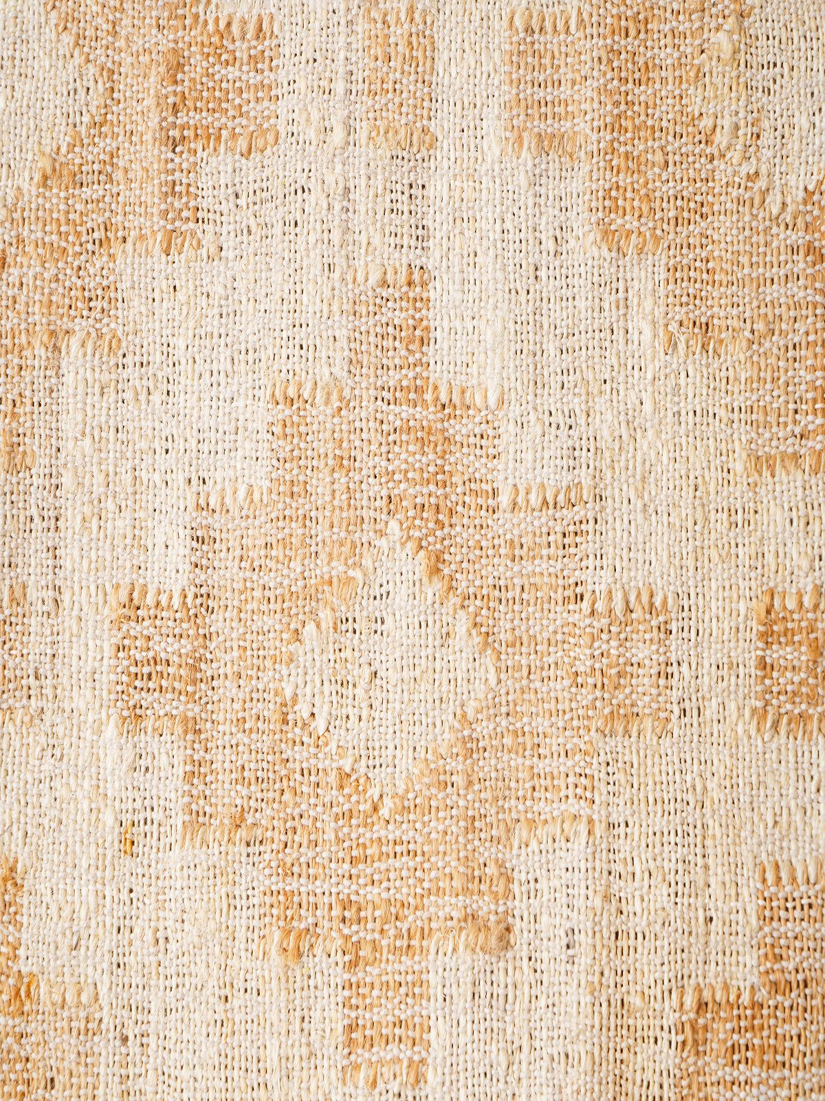 Monochrome multi Kilim Jute Rug jute rug styled in a living room interior with timber and linen