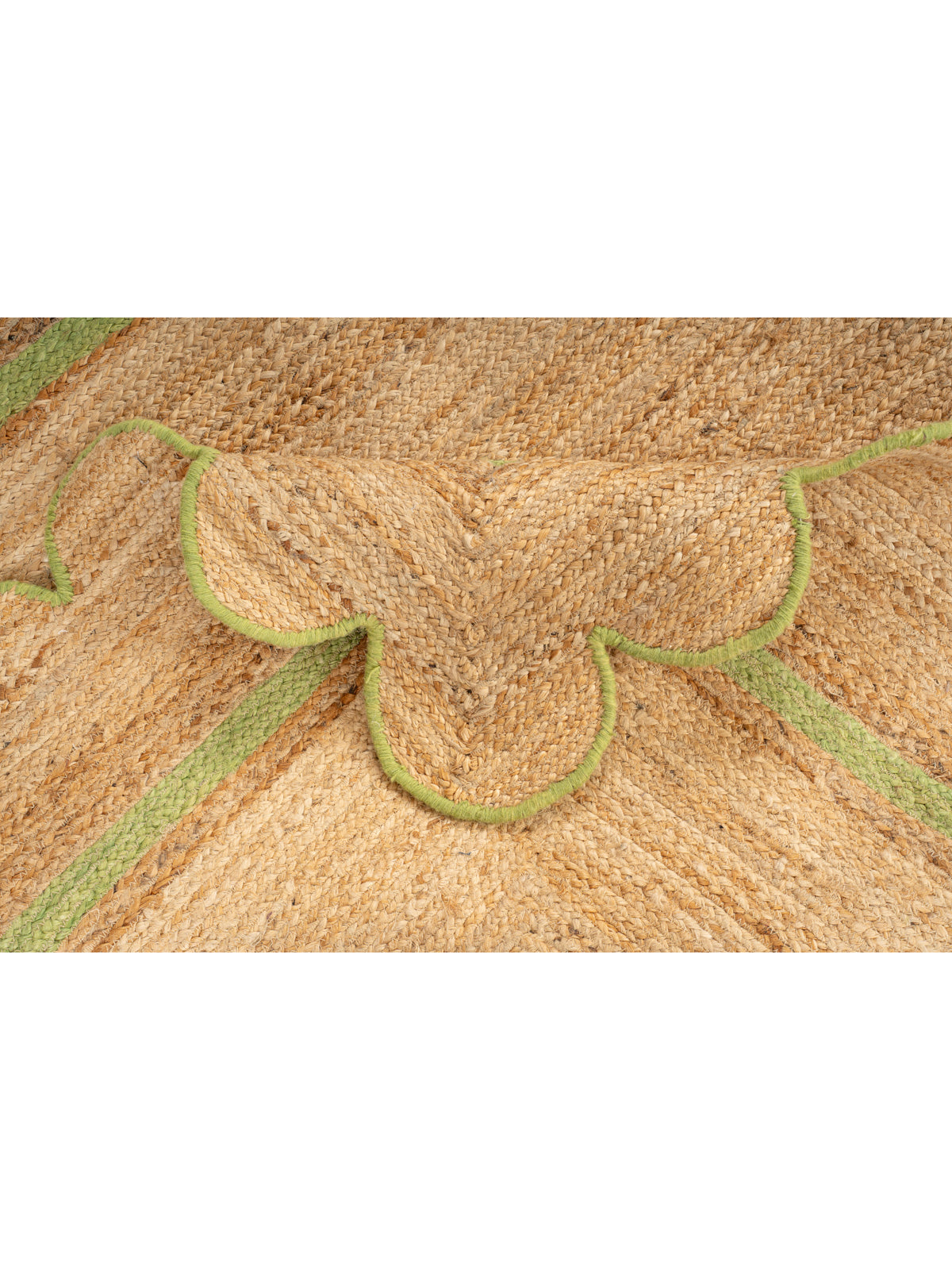 Moroni scalloped area rug-Leaf green detail showing the textured cotton surface and finishing