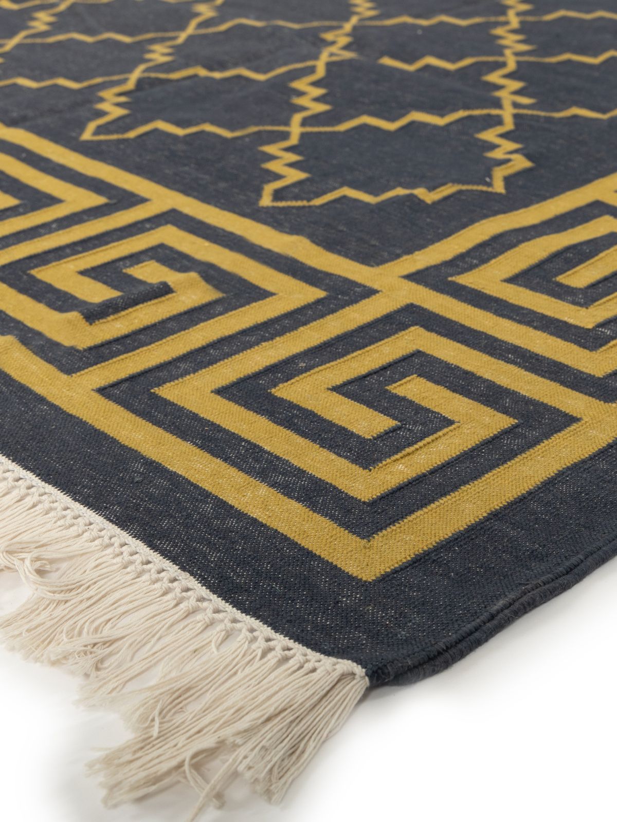 Nautical Jali Flatweave rug close-up showing the cotton weave and geometric motif